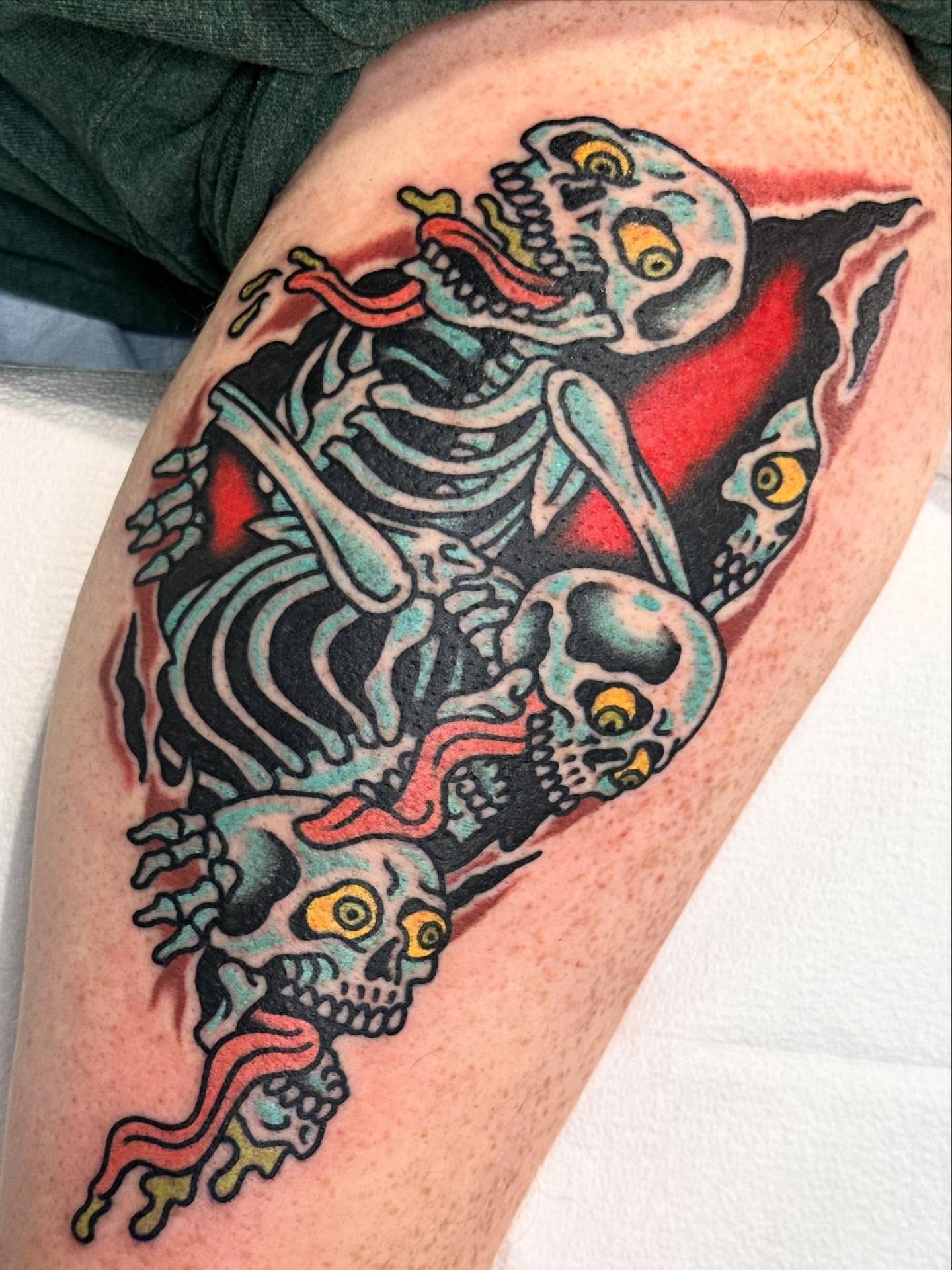 Skeletons American traditional tattoo on the thigh by Cody Woolard, Seymour, Tennessee