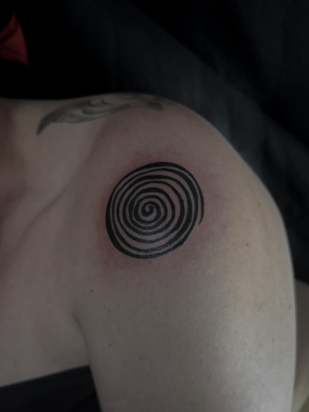 Concentric spiral surrealism tattoo on the shoulder by ☆ ciara ☆