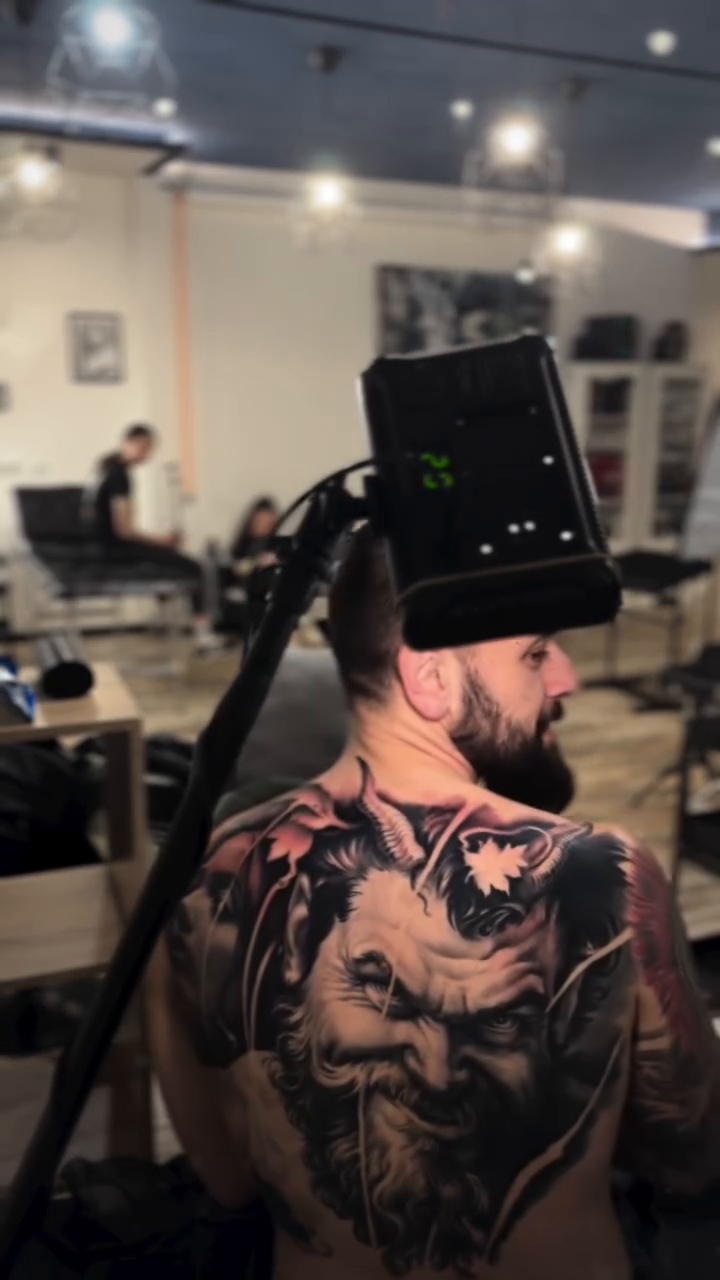 Man's face with beard realism tattoo by Tony Ink