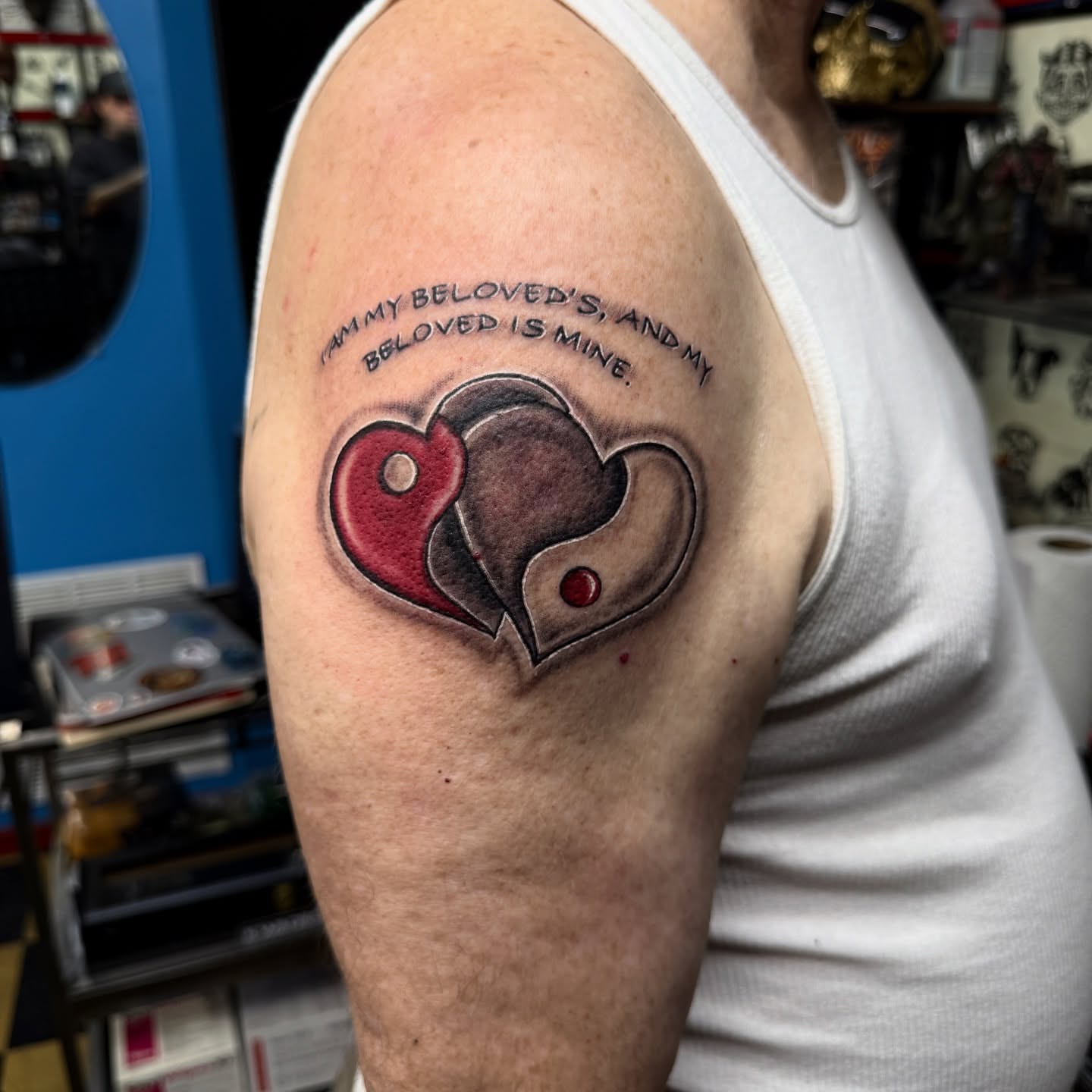 Heart yin-yang realism tattoo on the shoulder by Gary Chase