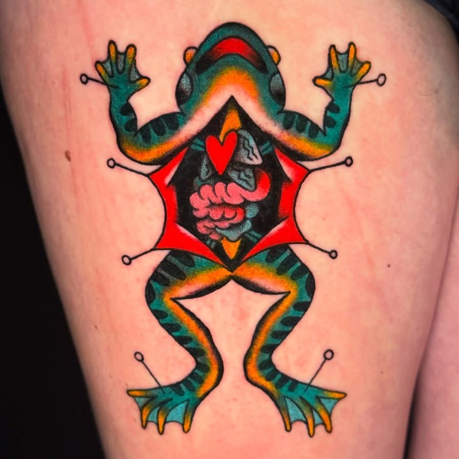 Frog American traditional tattoo on the thigh by Mallory Brown