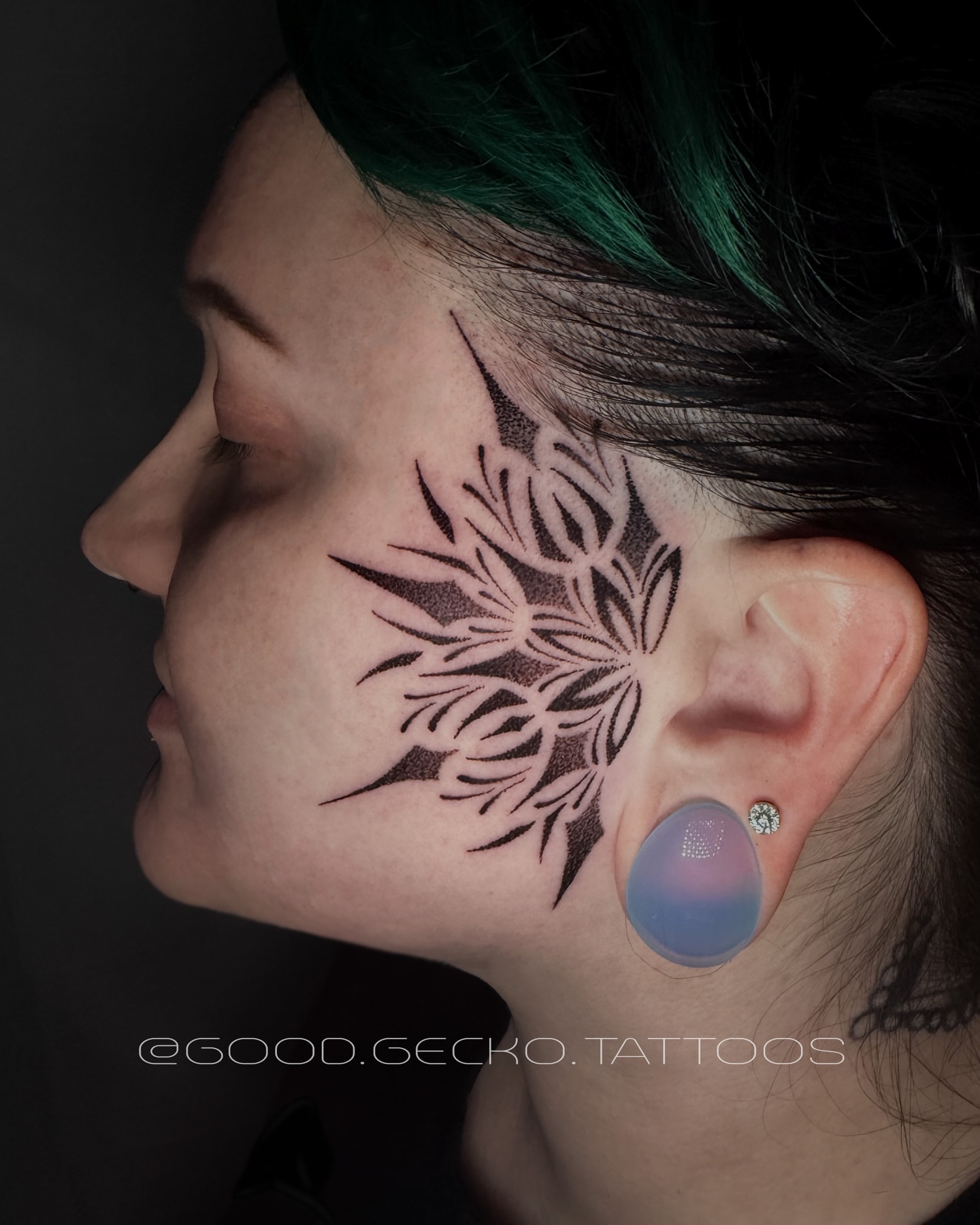 Floral design dotwork tattoo on the neck by Gecko