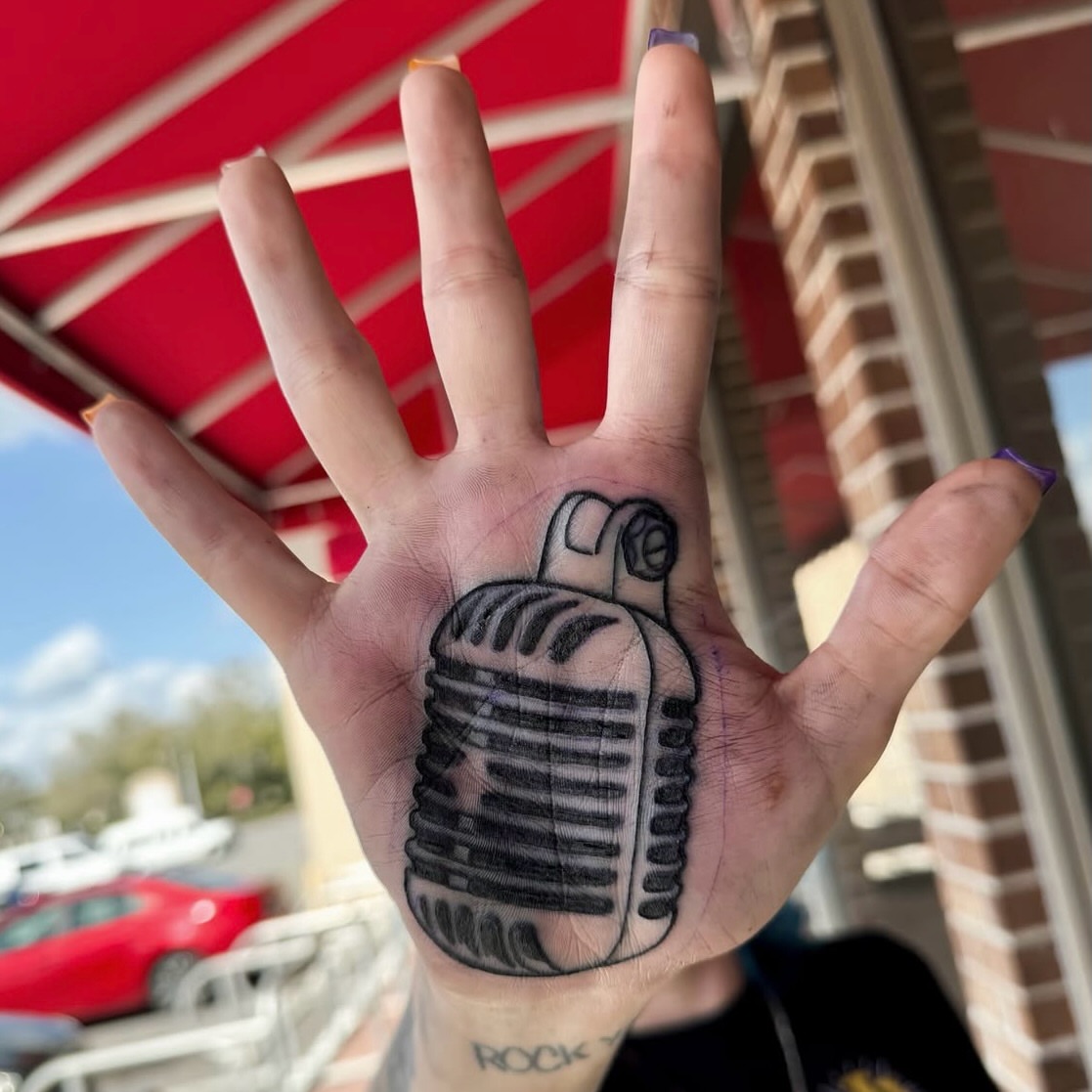 Microphone black and grey tattoo on the hand by Hades cabrera, Richmond, Virginia