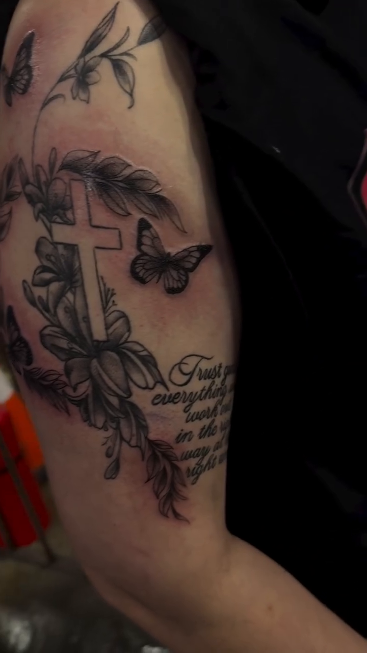 Cross with wreath and butterflies realism tattoo by Houston Tattoo Artist
