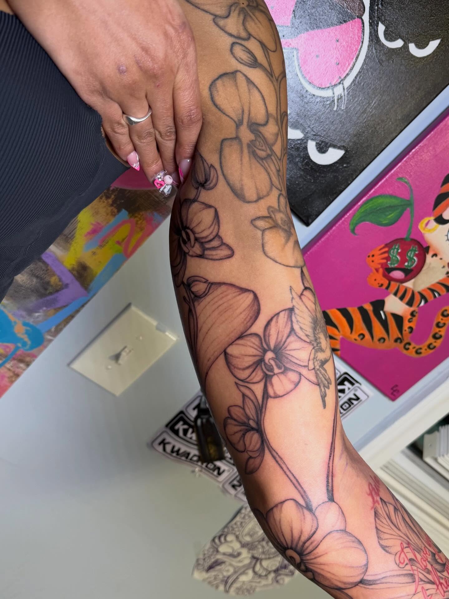 Floral bouquet black and grey tattoo on the forearm by Stephania ATLANTA TATTOO ARTIST🎨