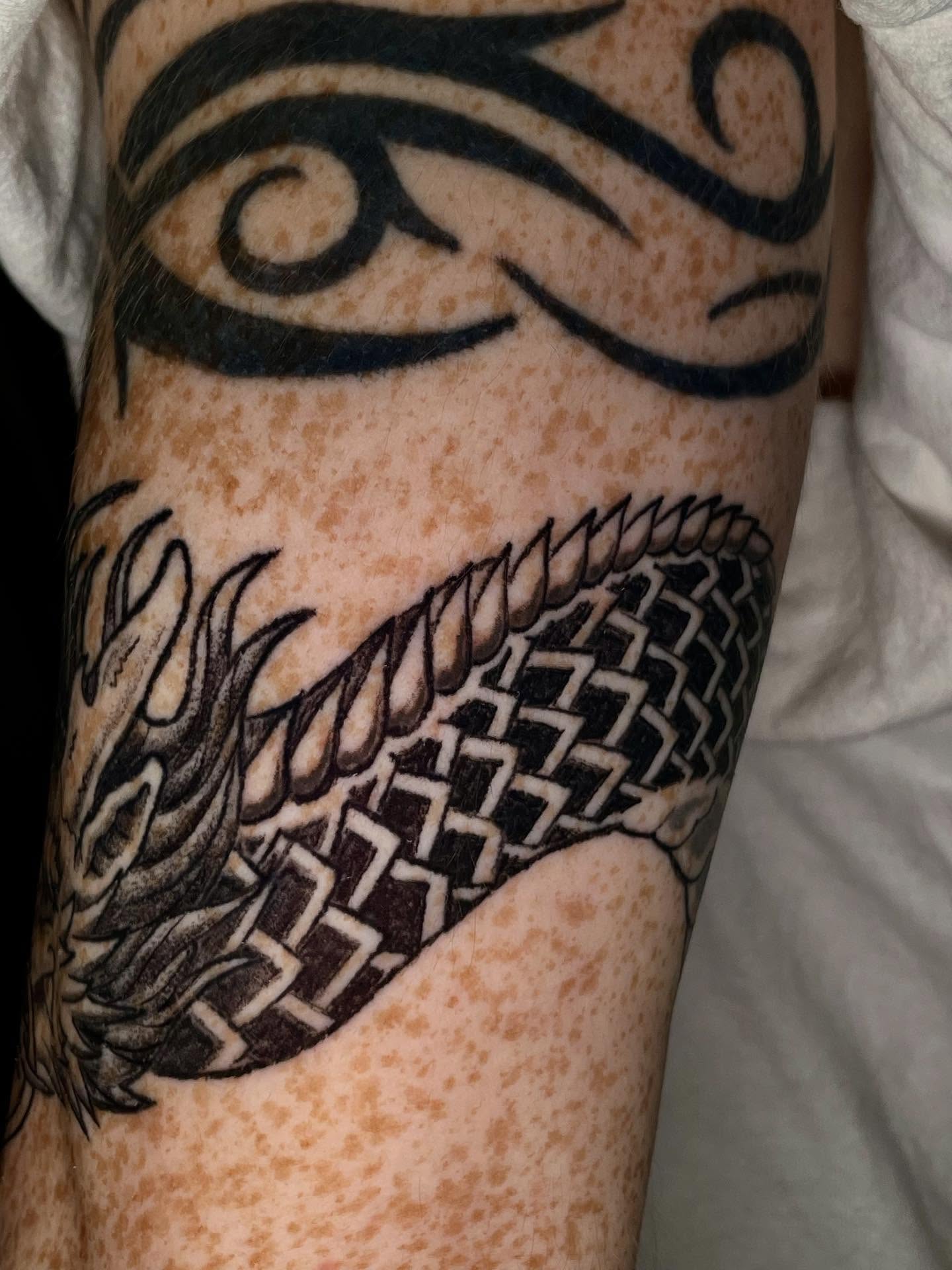 Eye and dragon tribal tattoo on the forearm by ๐ท๐ซKevan๐๐ท