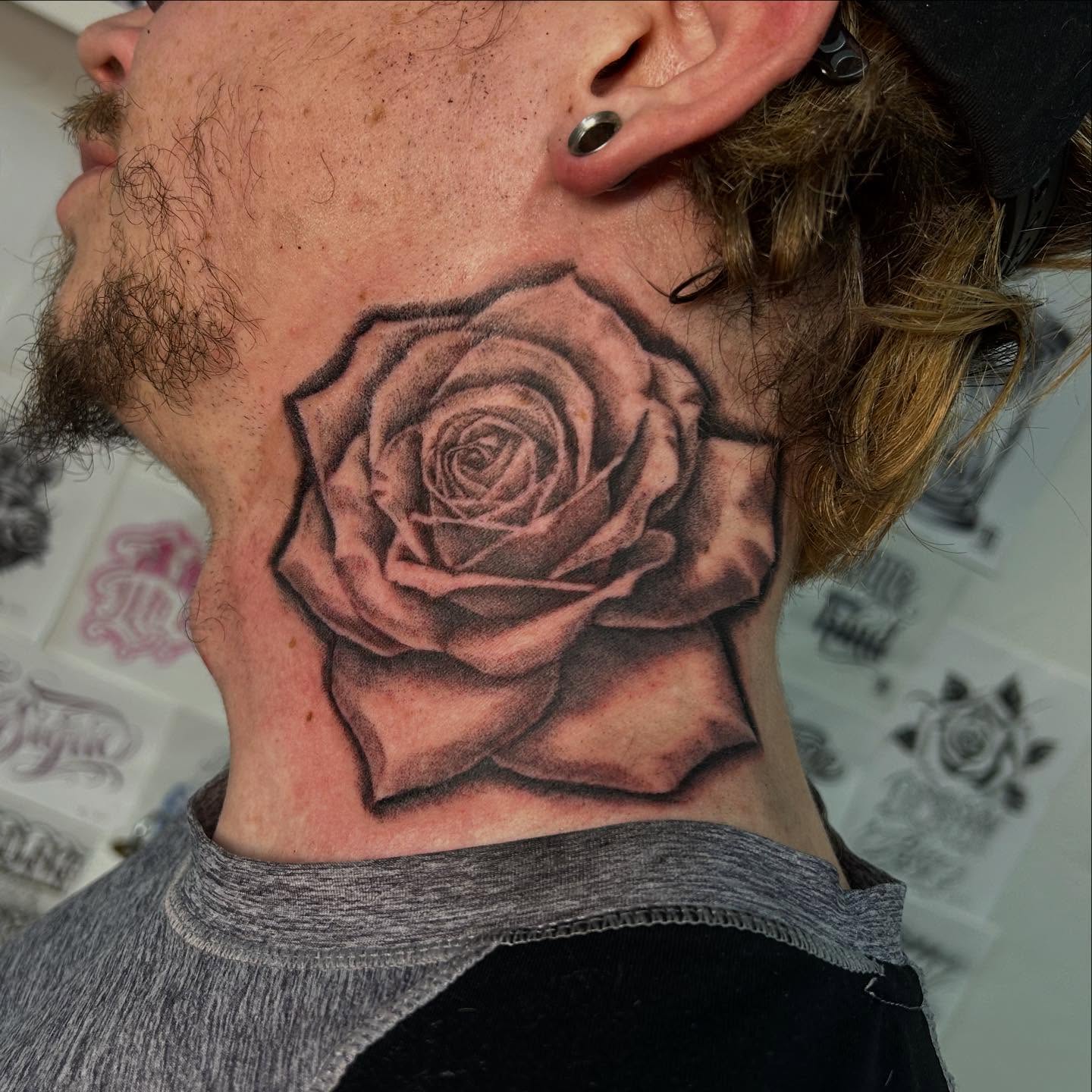 Rose black and grey tattoo on the neck by Ximena Favela