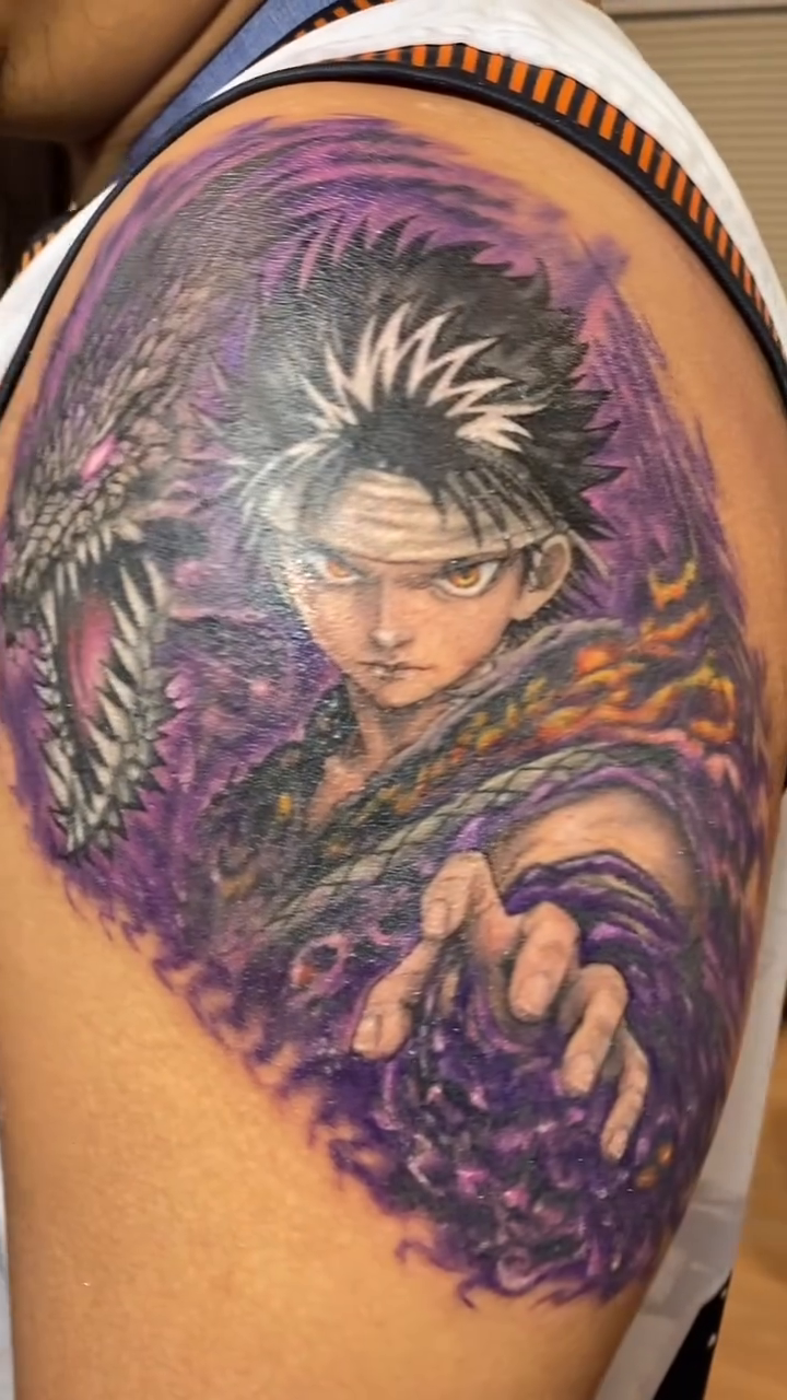 Anime character with purple smoke anime tattoo on the shoulder by Ferds Villanueva