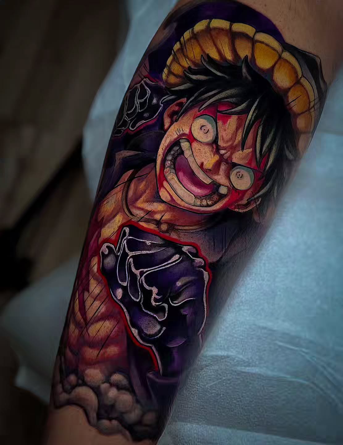 Anime character anime tattoo on the forearm by Bo