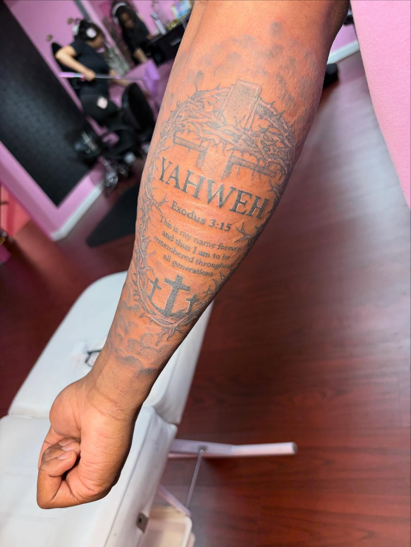 Religious text black and grey tattoo on the forearm by addicted222inkk🎨