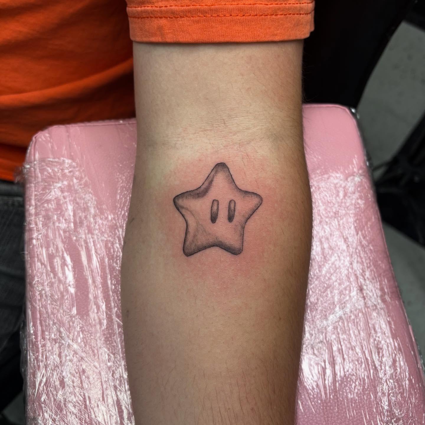 Star black and grey tattoo on the forearm by Joe ⋆₊⋆☢︎⁺₊⚠︎₊⋆