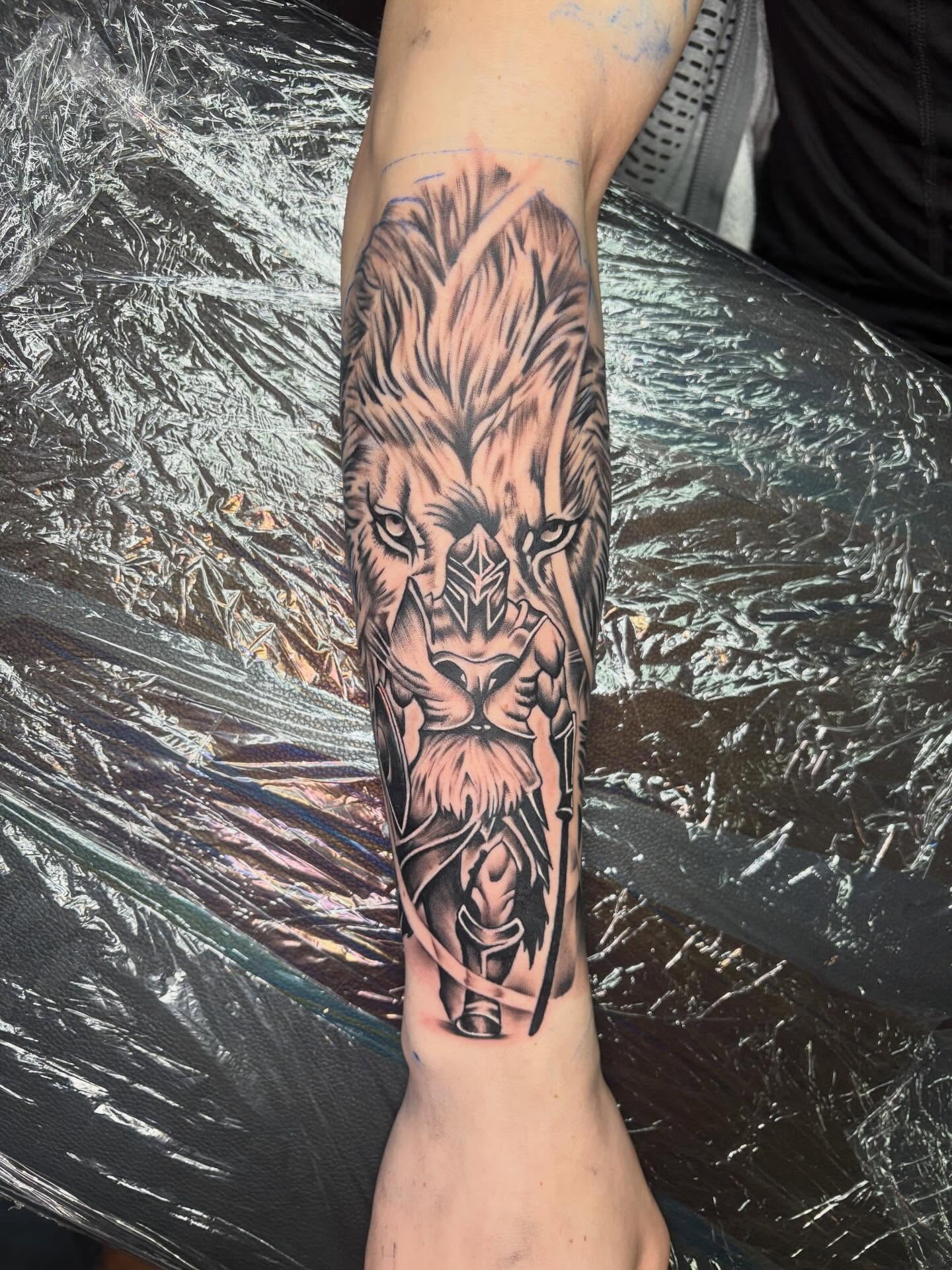 Lion realism tattoo on the forearm by 𓂀 𝕊ℍ𝔼𝕃𝕃𝕐 𓂀