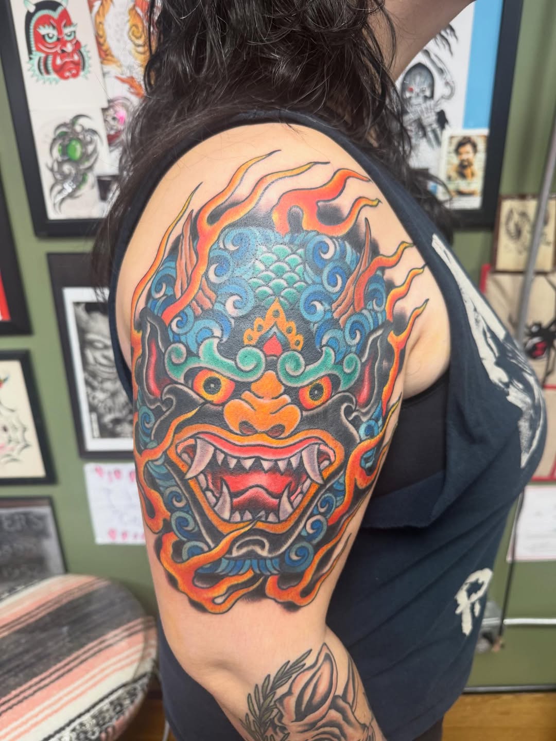 Japanese demon mask Japanese tattoo on the shoulder by Cody Dalton