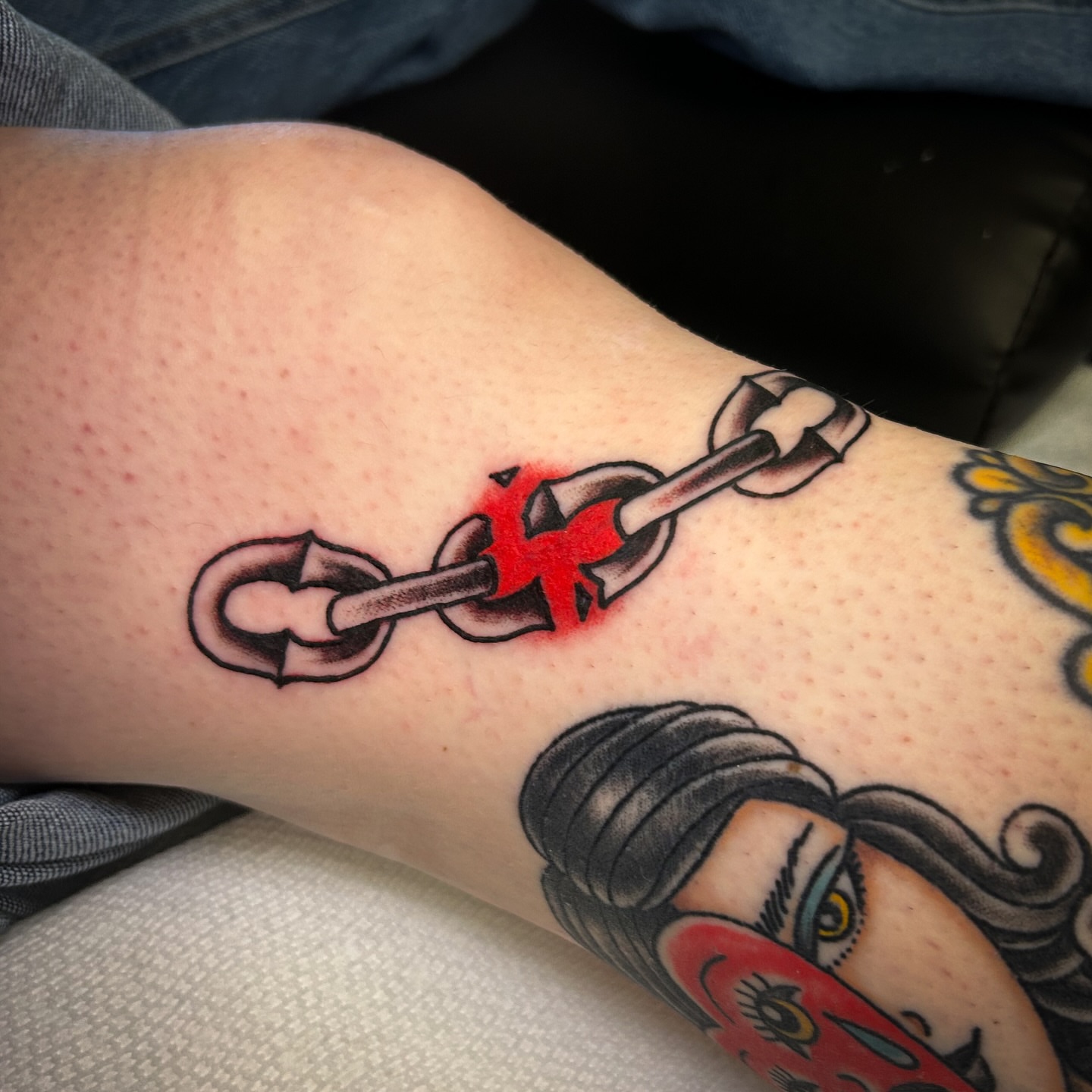 Broken chain American traditional tattoo on the forearm by Jessica Oram Brockman, Dayton, Ohio