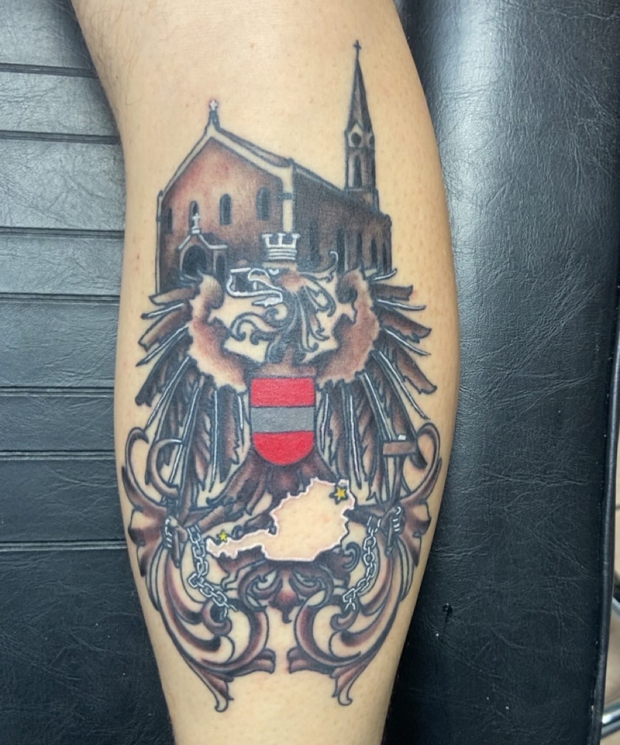 Coat of arms American traditional tattoo on the forearm by Erin McGloin