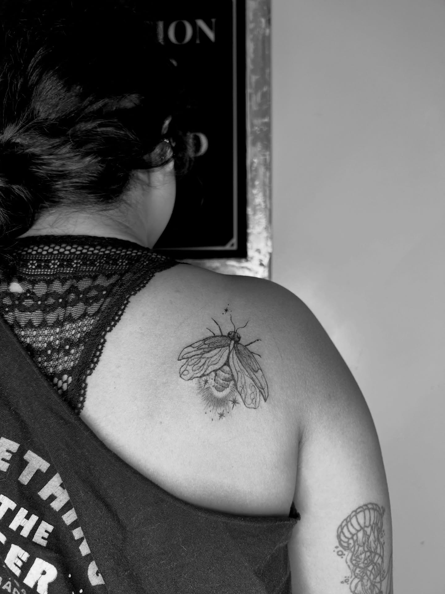 Moth black and grey tattoo on the shoulder by Sarah