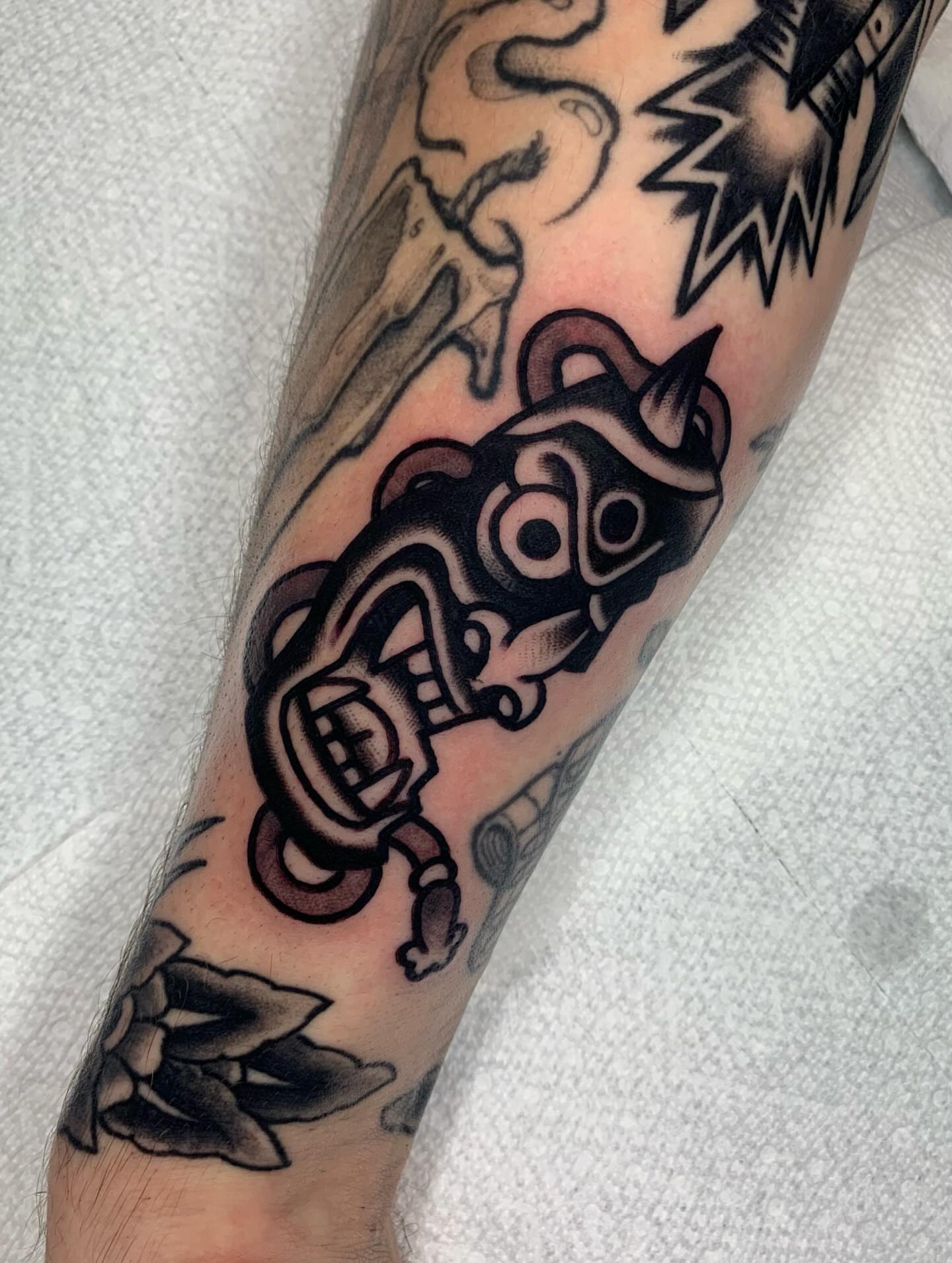 Robot American traditional tattoo on the forearm by Shawn VanKirk