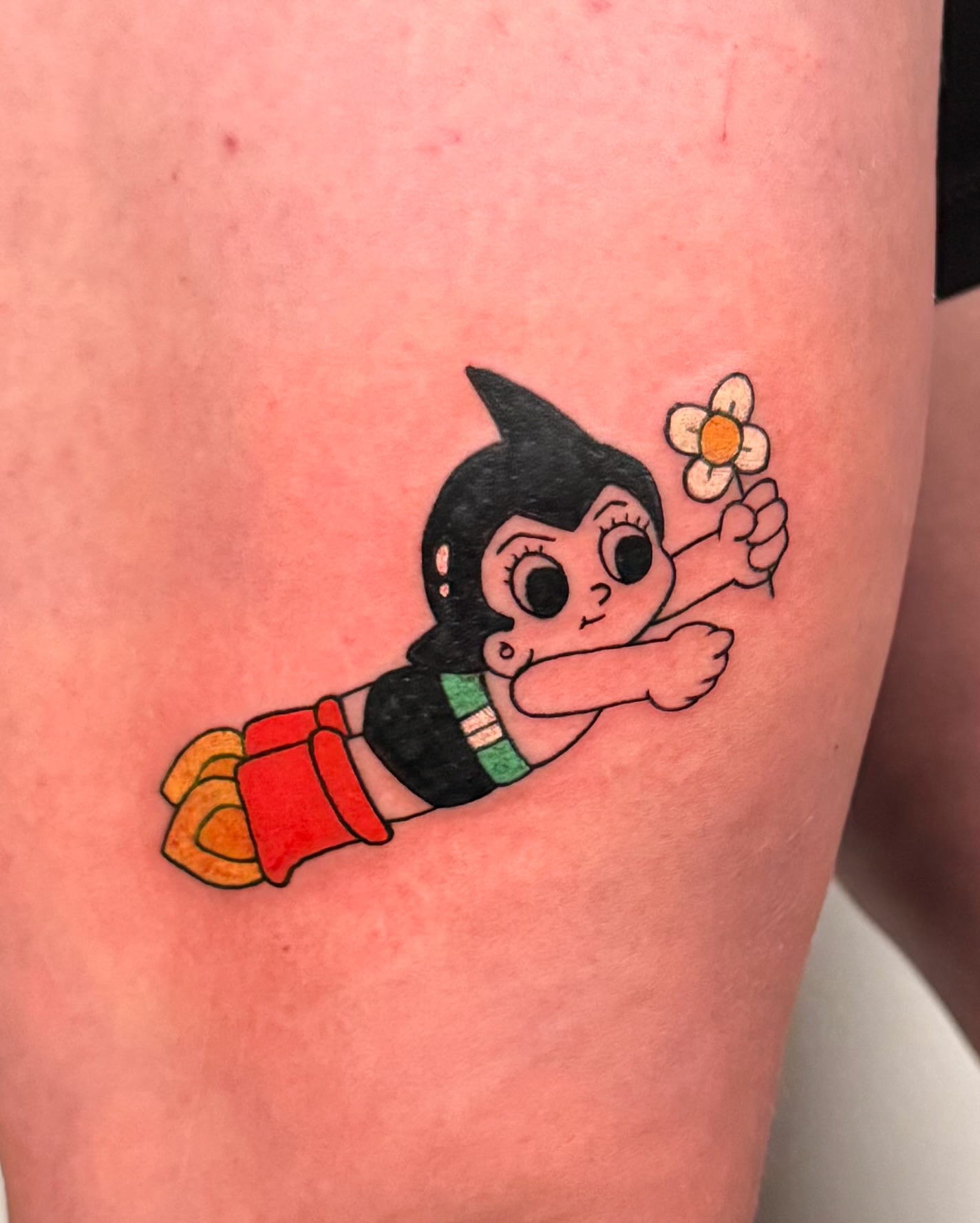 Astro Boy anime tattoo on the thigh by binh