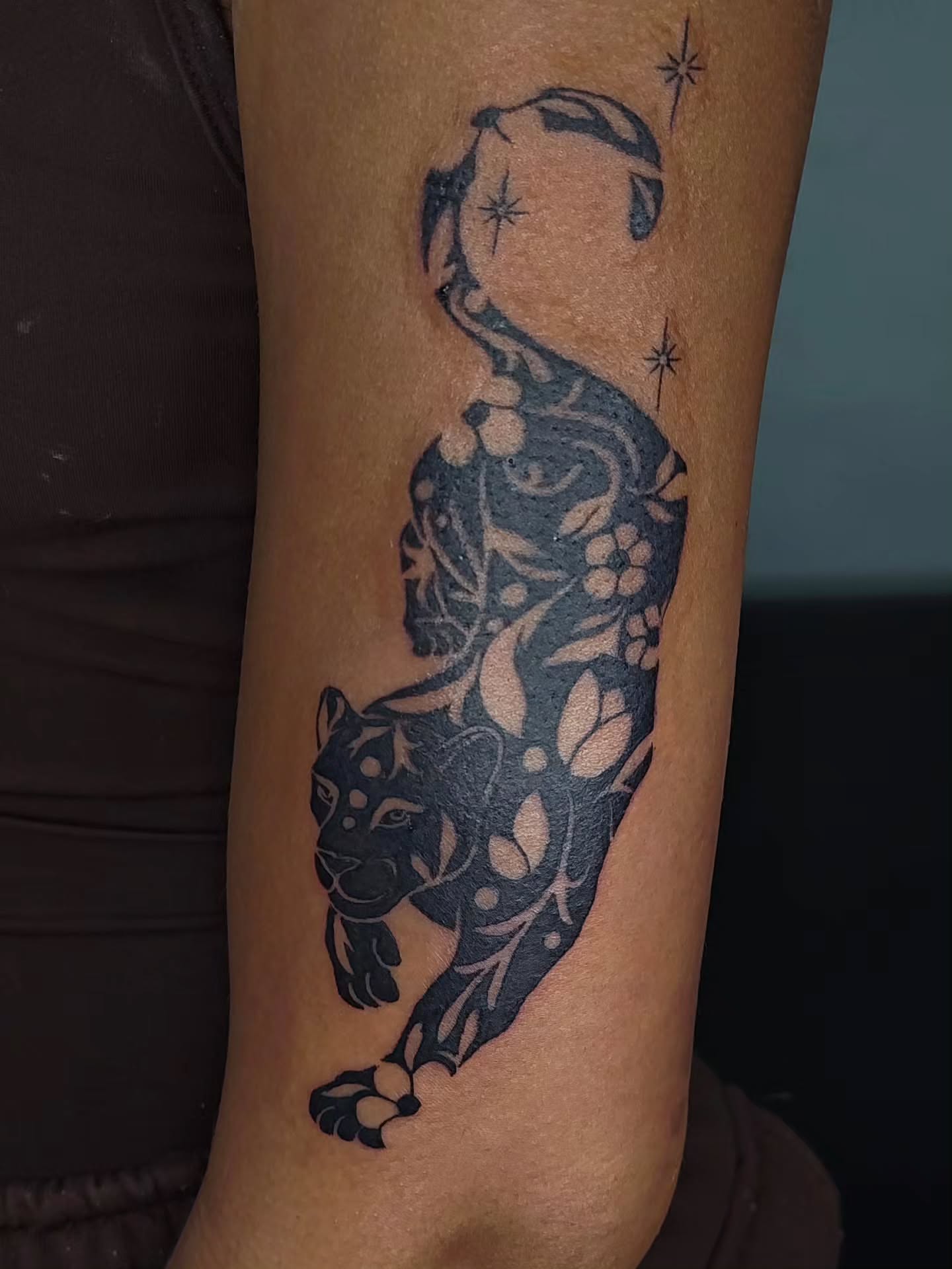 Panther black and grey tattoo on the forearm by Luna 🌙