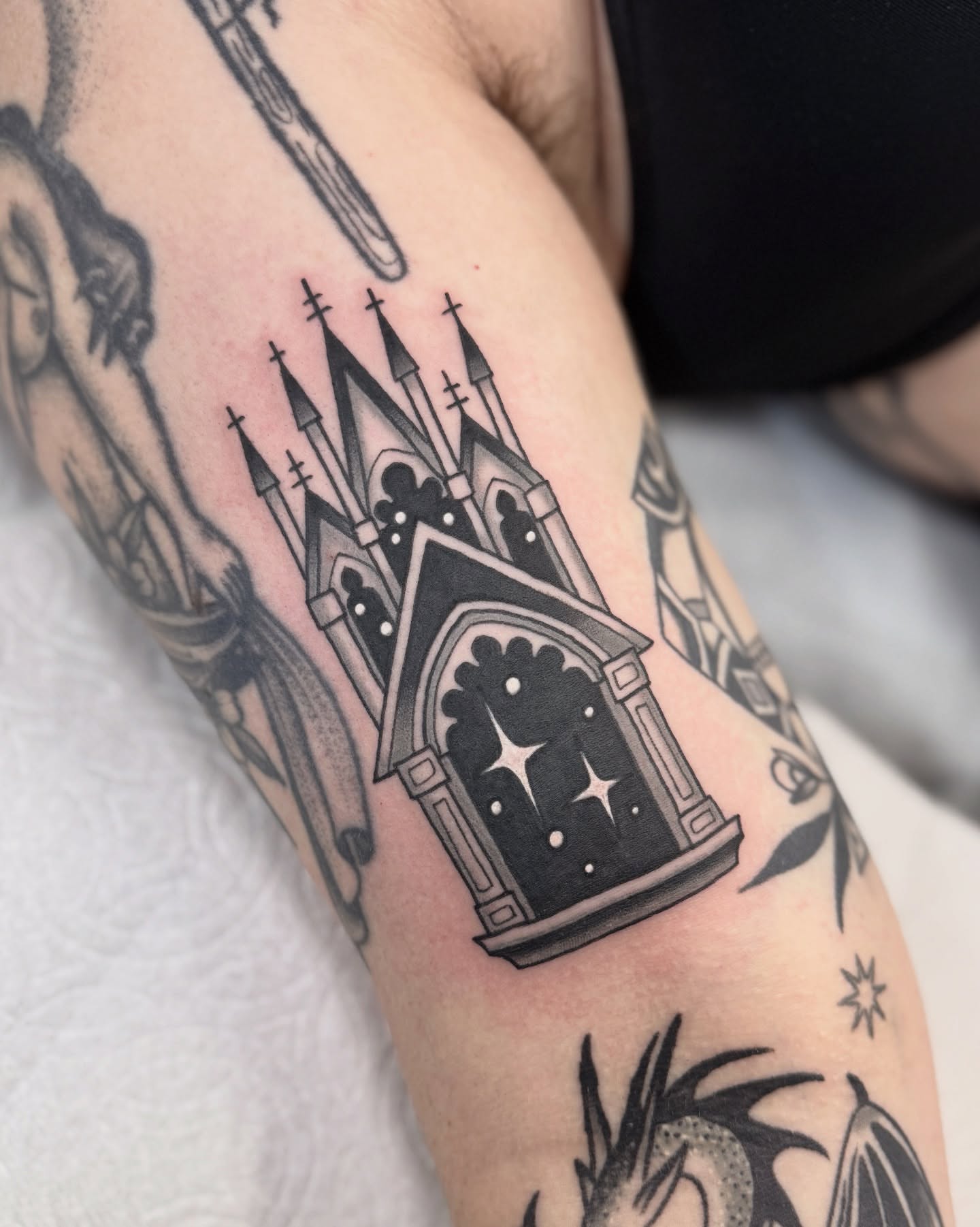 Gothic cathedral black and grey tattoo on the forearm by Nia (Knee-uhh) 🦷