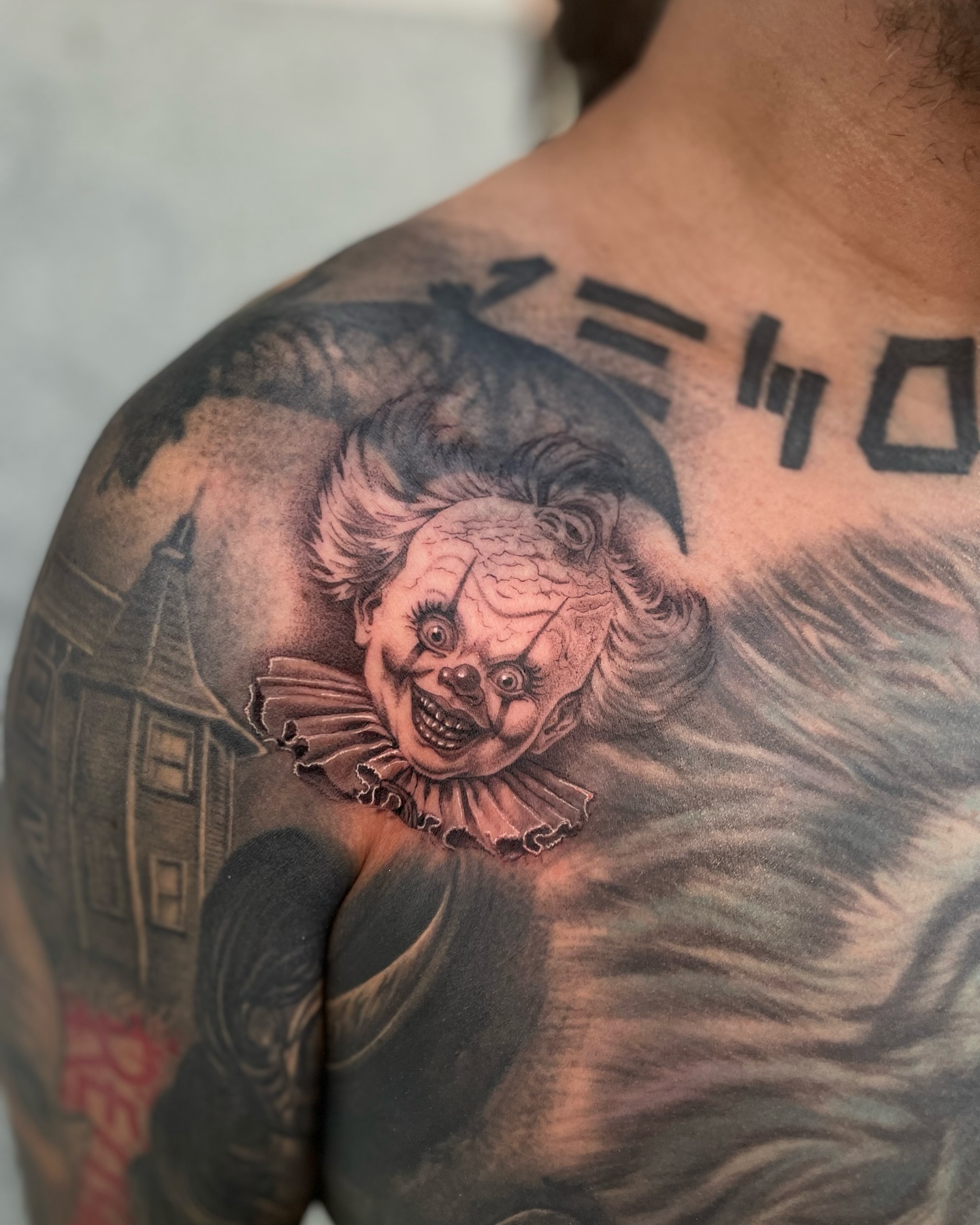 Pennywise the clown realism tattoo on the shoulder by Chato
