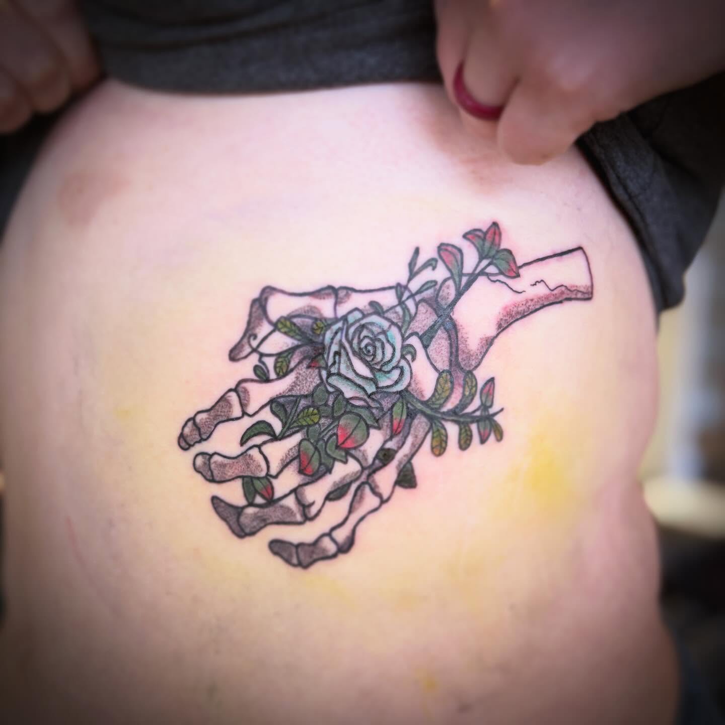 Gun and roses dotwork tattoo on the shoulder by Runtz Tattoo, Greensboro, North Carolina