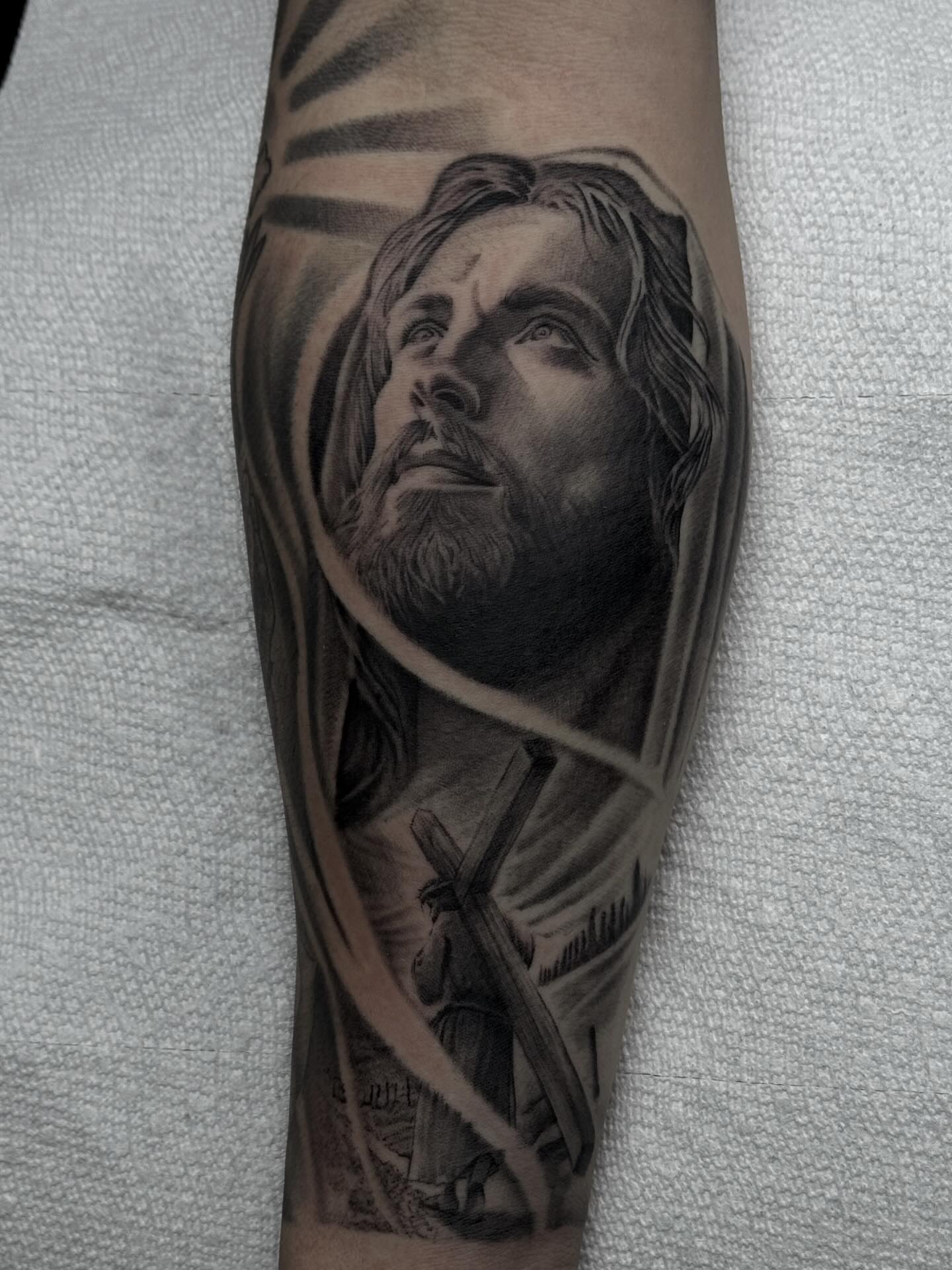 Tattoo by @grineylagantattoo — realism, black_and_grey