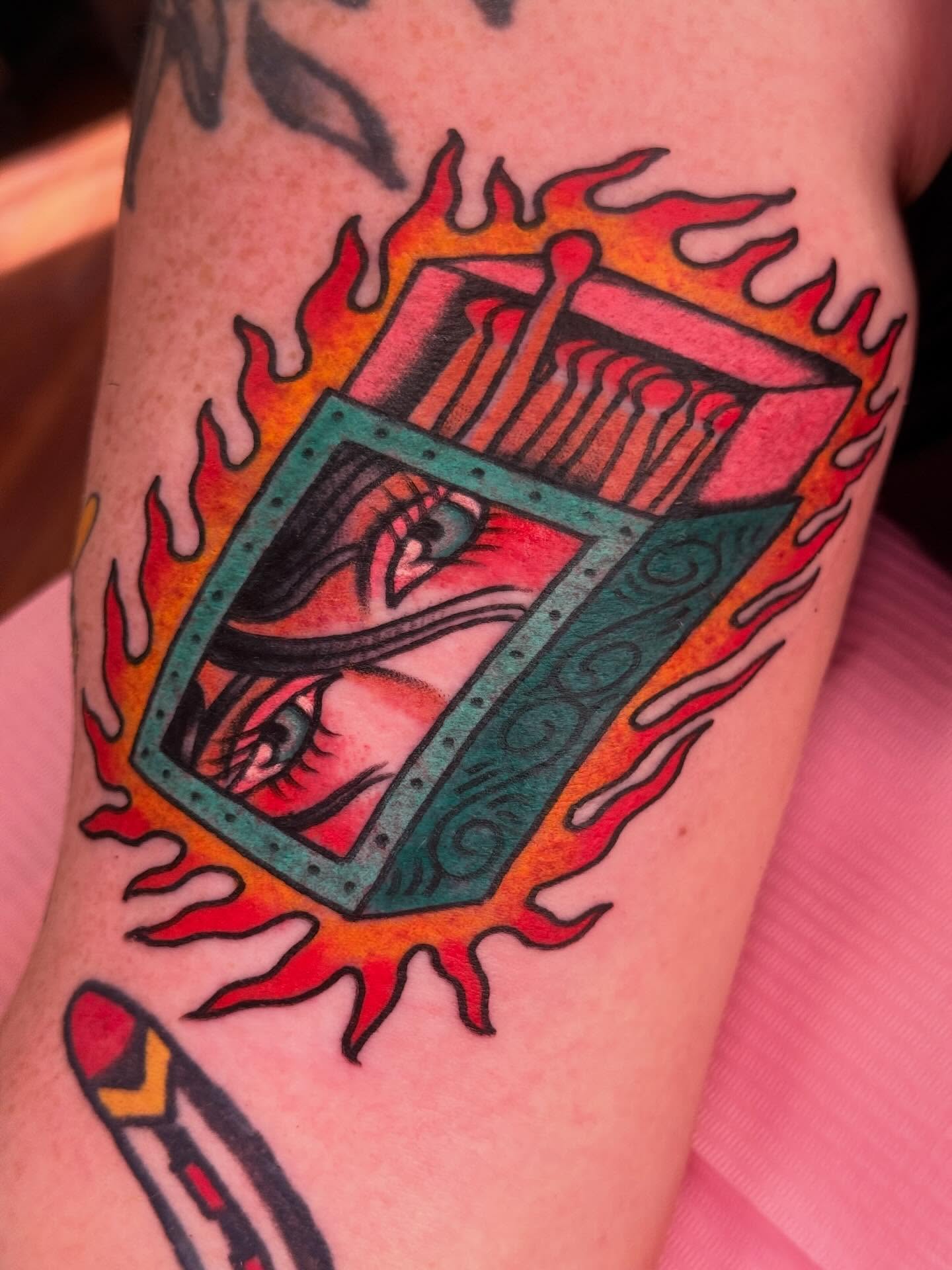 Eye and matches American traditional tattoo on the forearm by Cassie O'Neal DeBord