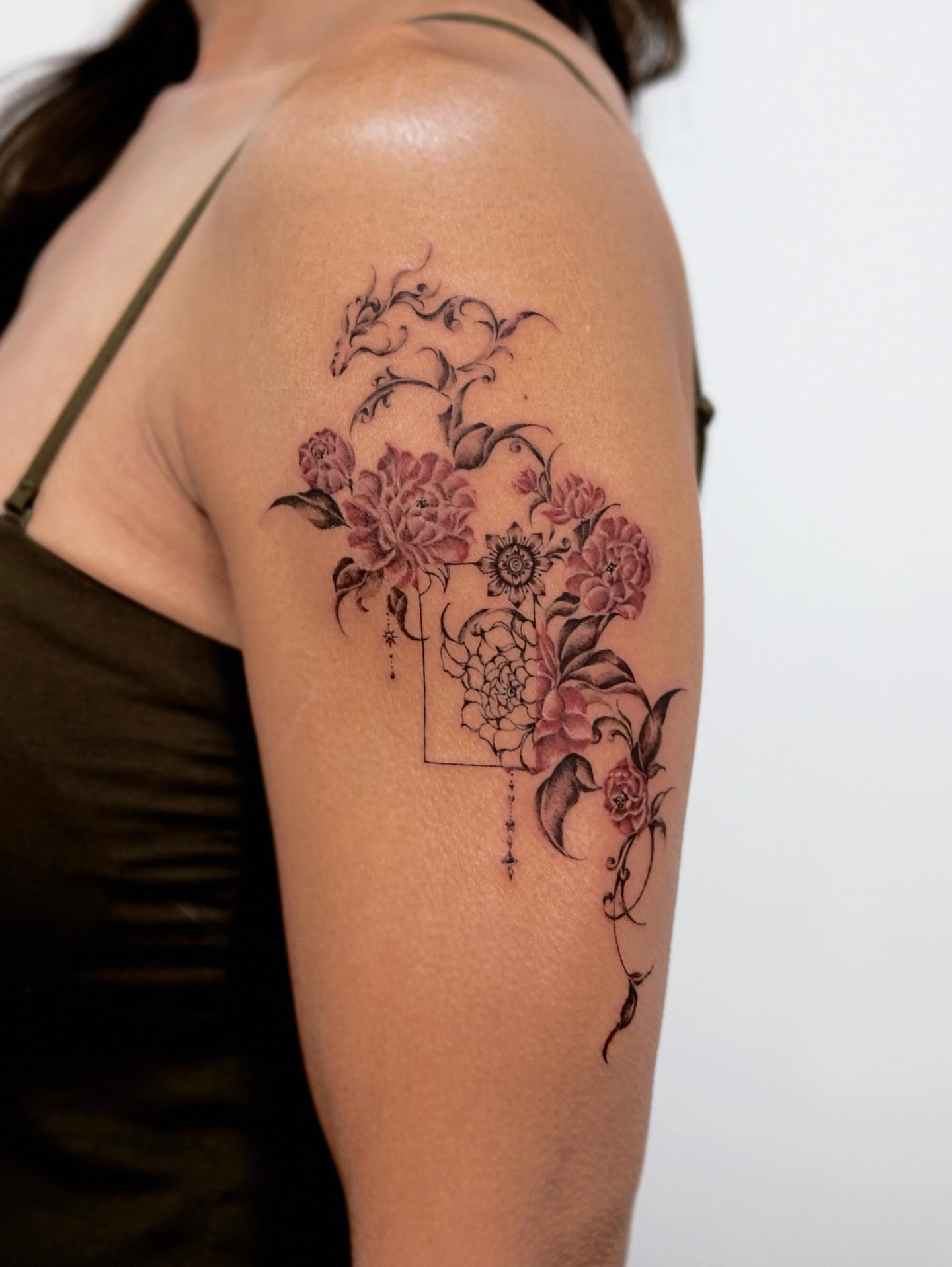 Floral arrangement black and grey tattoo on the shoulder by 애박 ⋆⁺₊ ₊⁺⋆ Aebak