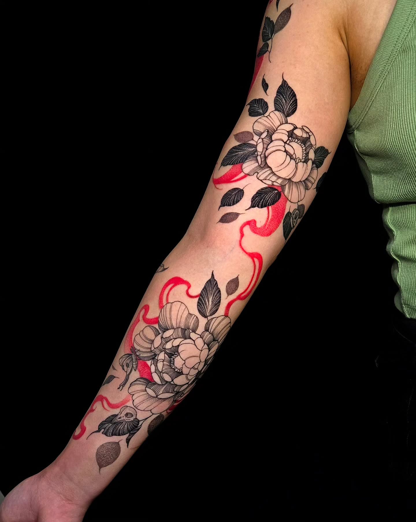 Floral bouquet American traditional tattoo on the forearm by Jesseca Chinchilla