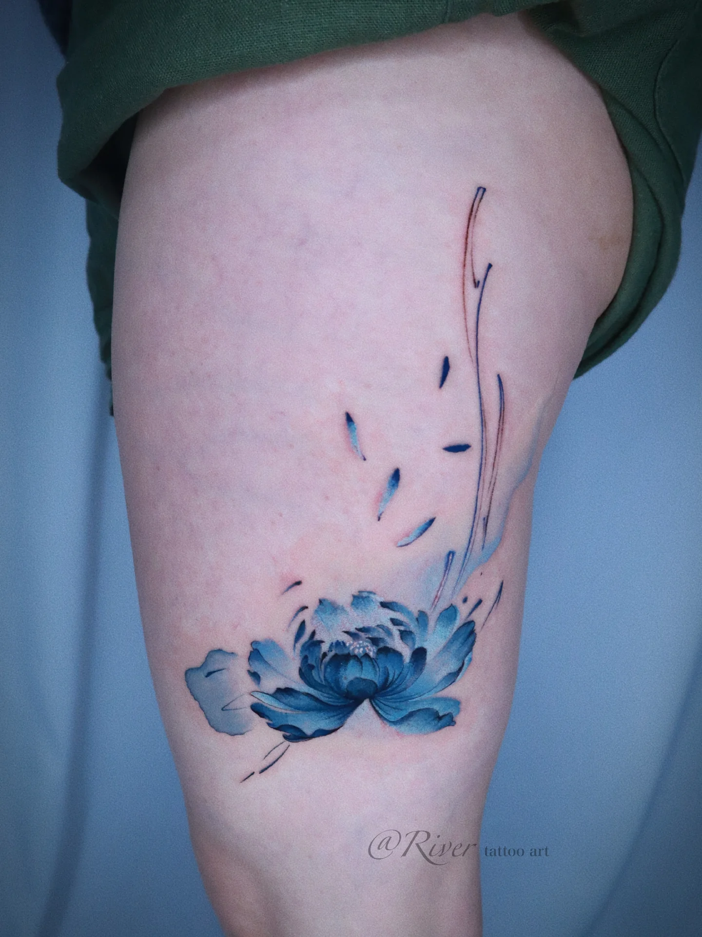 Peony watercolor tattoo on the thigh by River