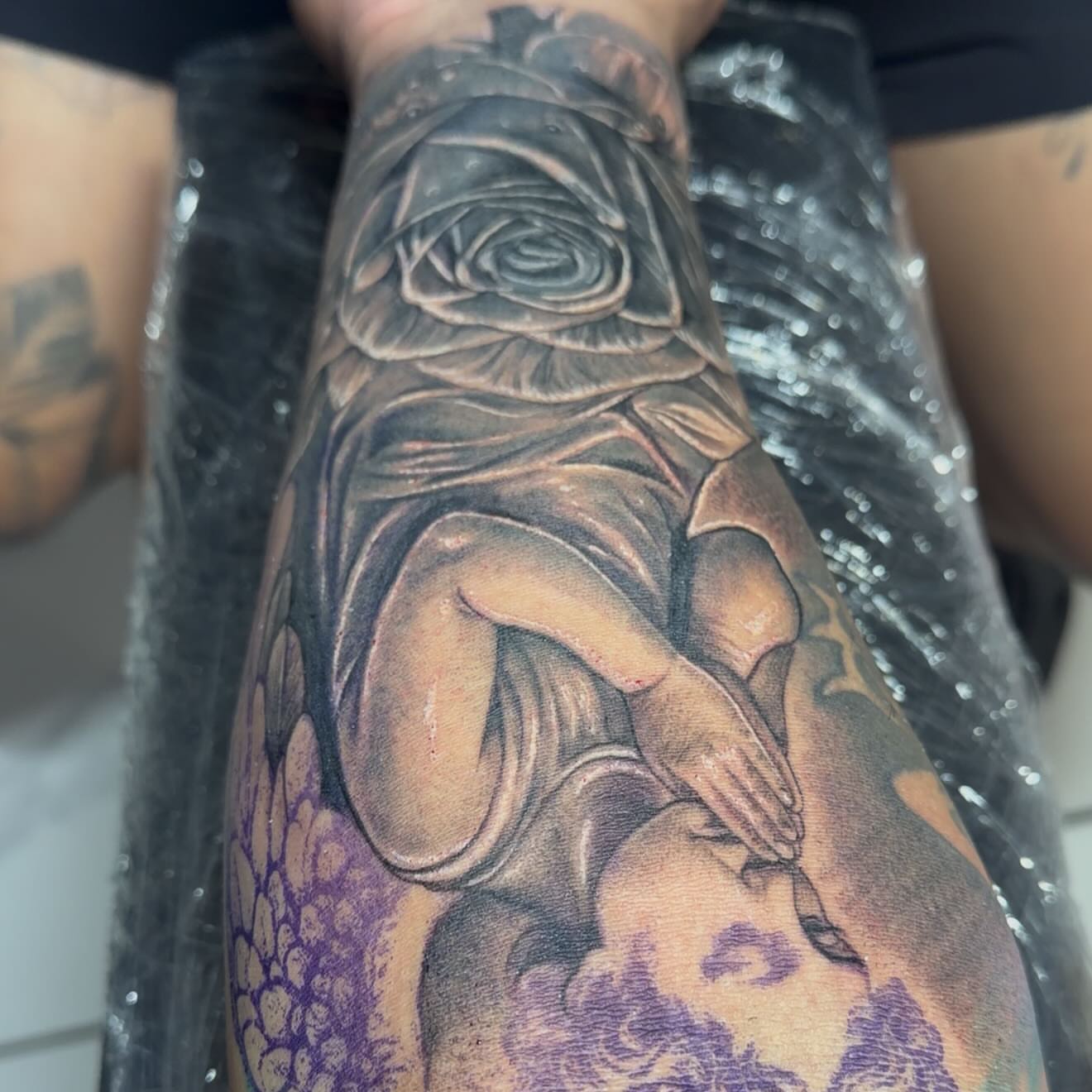Religious figure realism tattoo on the forearm by Adrian gonzalez...