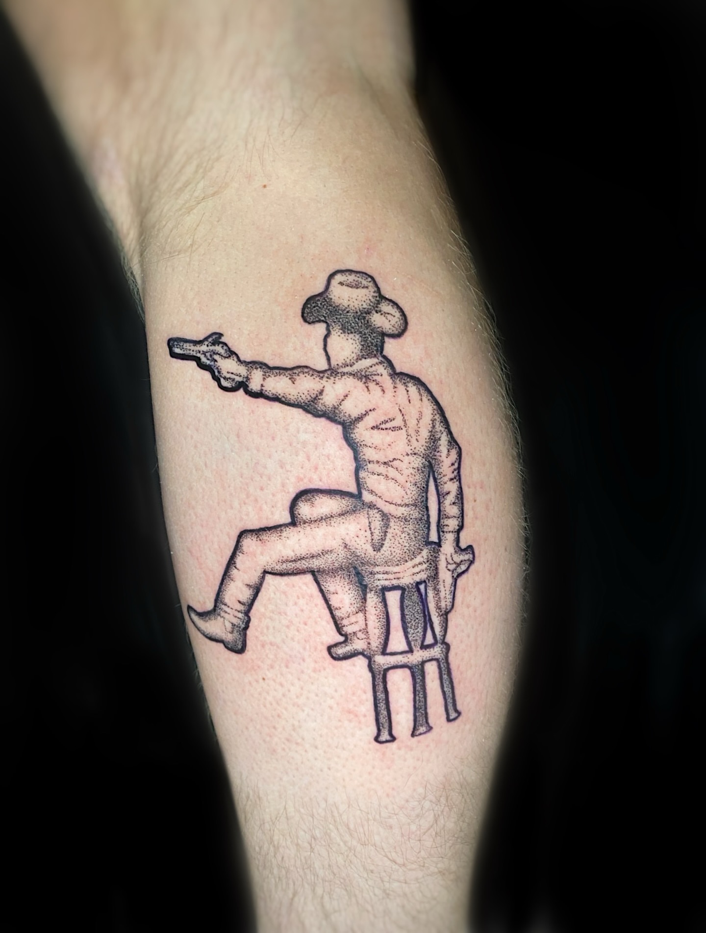 Cowboy shooting gun dotwork tattoo on the forearm by Cherry Jane 🍒