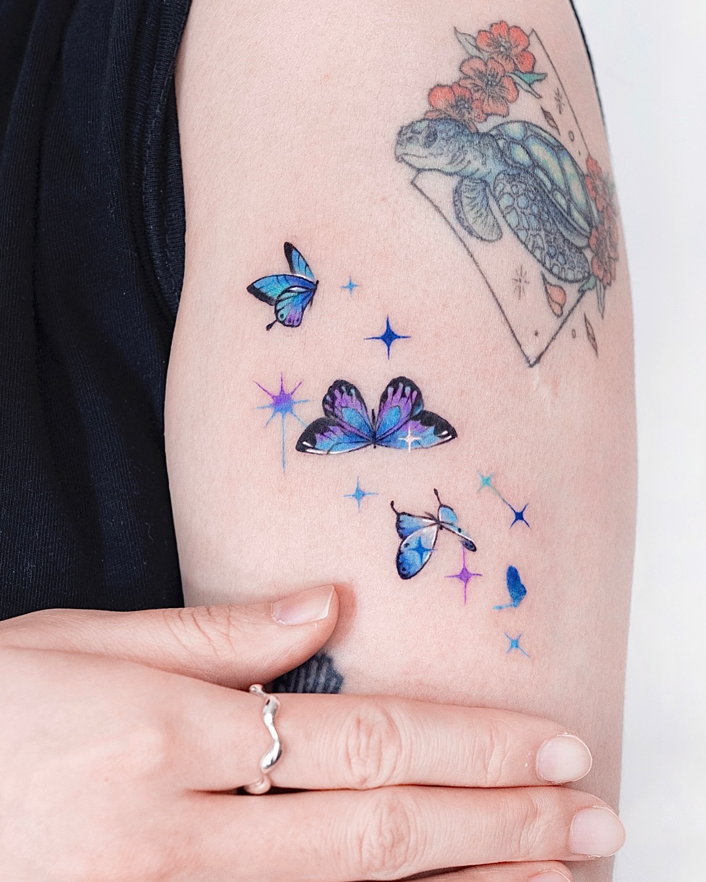 Butterflies watercolor tattoo on the forearm by 라이브 Live