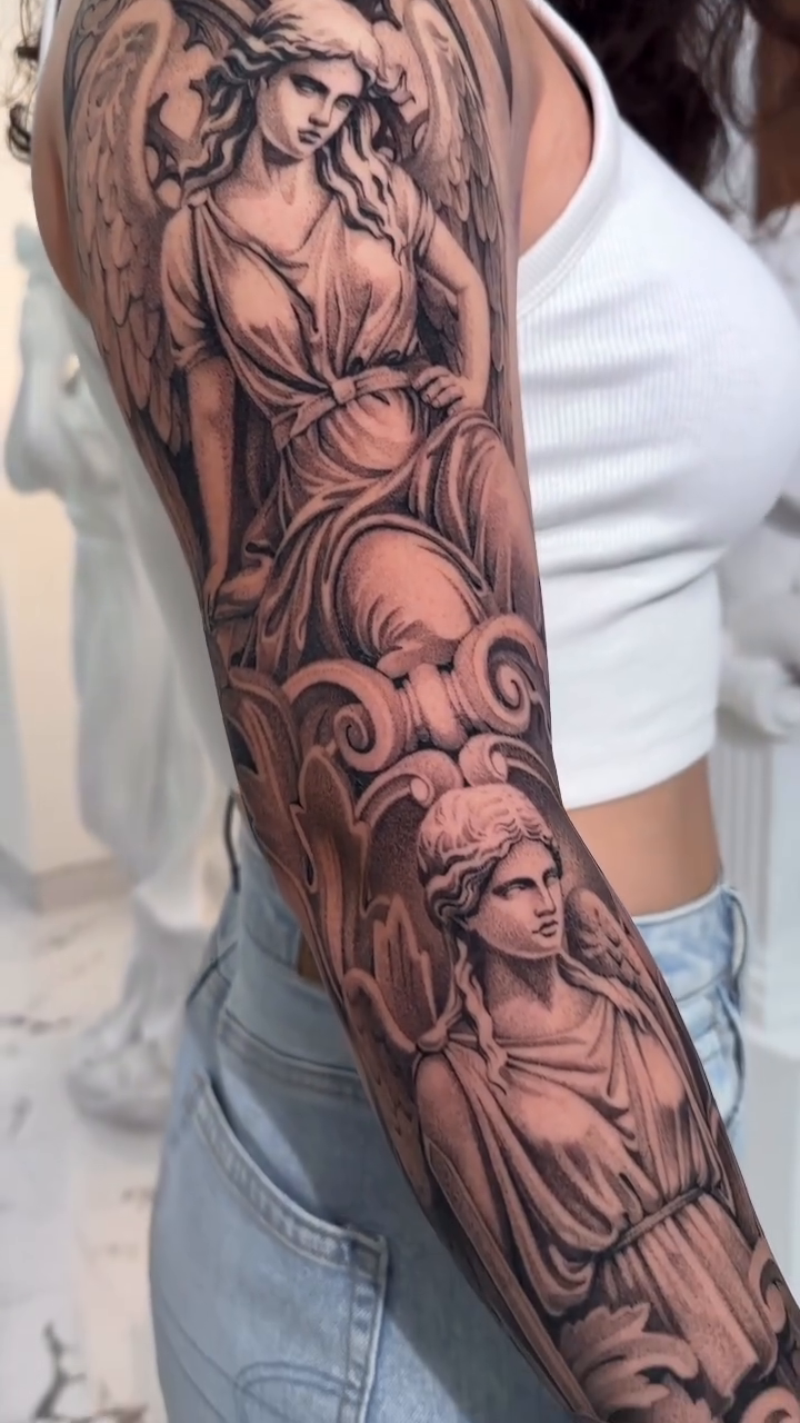 Angels and classical figures realism tattoo by Viktor Govorukhin