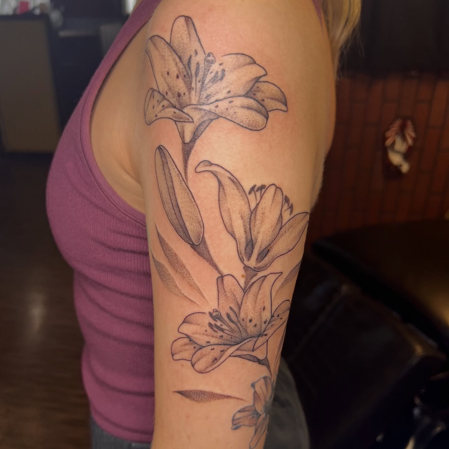 Lilies dotwork tattoo on the forearm by Dani McBay