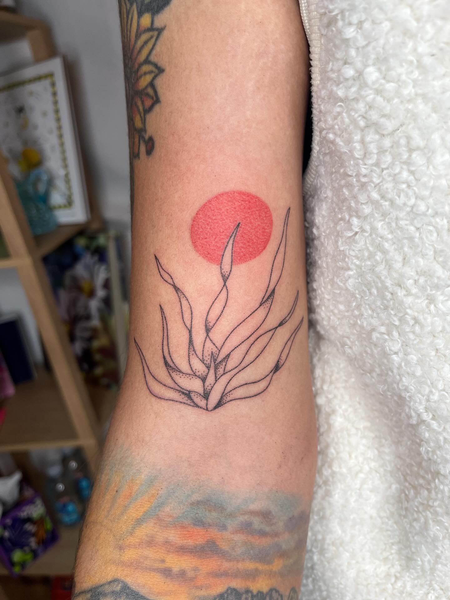 Agave plant minimalist tattoo on the forearm by natalie