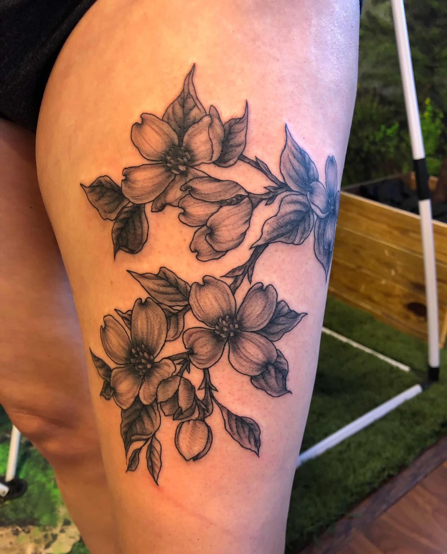 Flower bouquet black and grey tattoo on the thigh by Lake Stephens, Richmond, Virginia