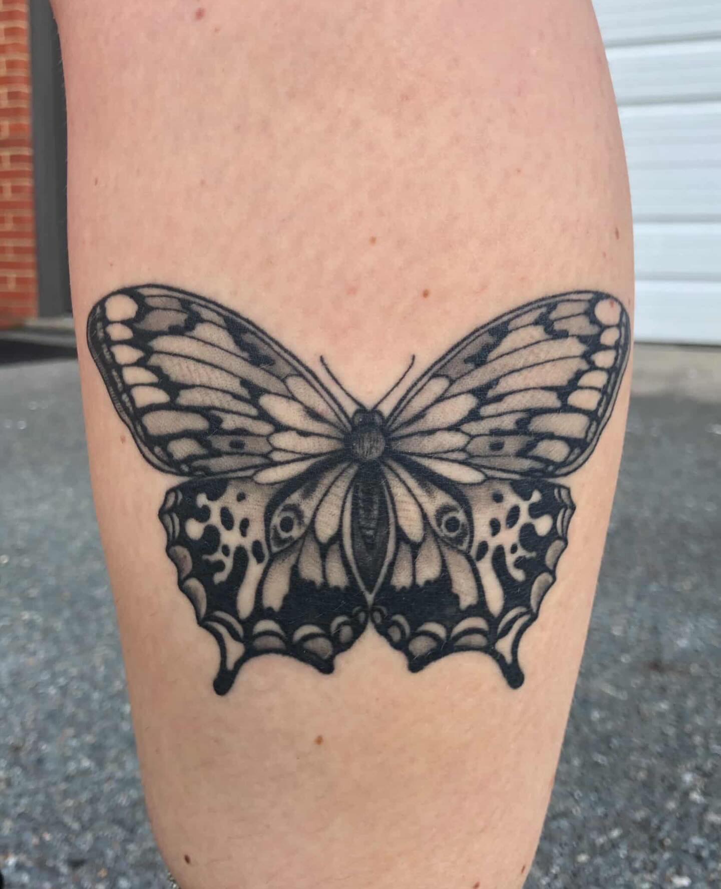 Butterfly black and grey tattoo on the forearm by Lake Stephens, Richmond, Virginia