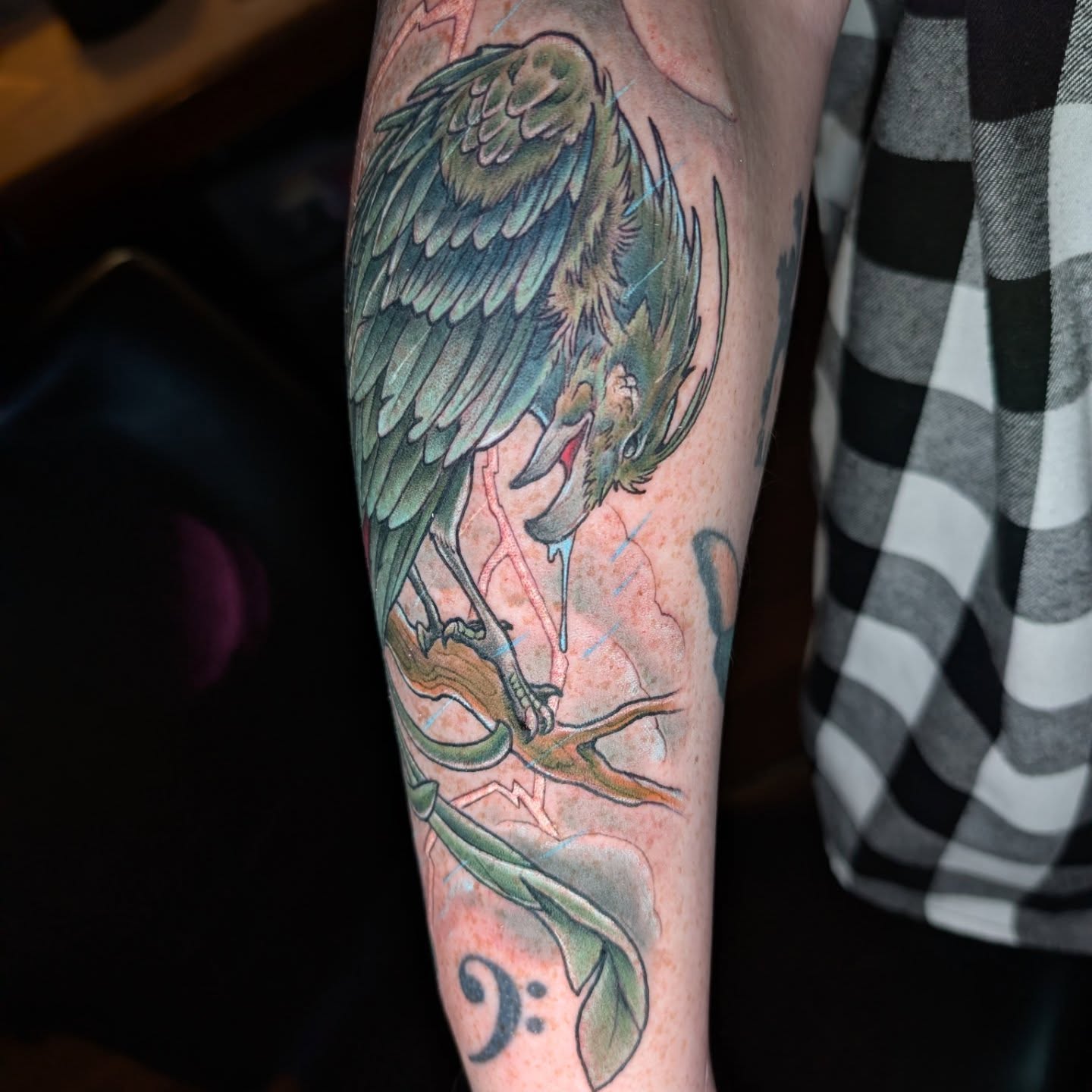 Bird and branch realism tattoo on the forearm by Will Alexander, Lombard, Illinois