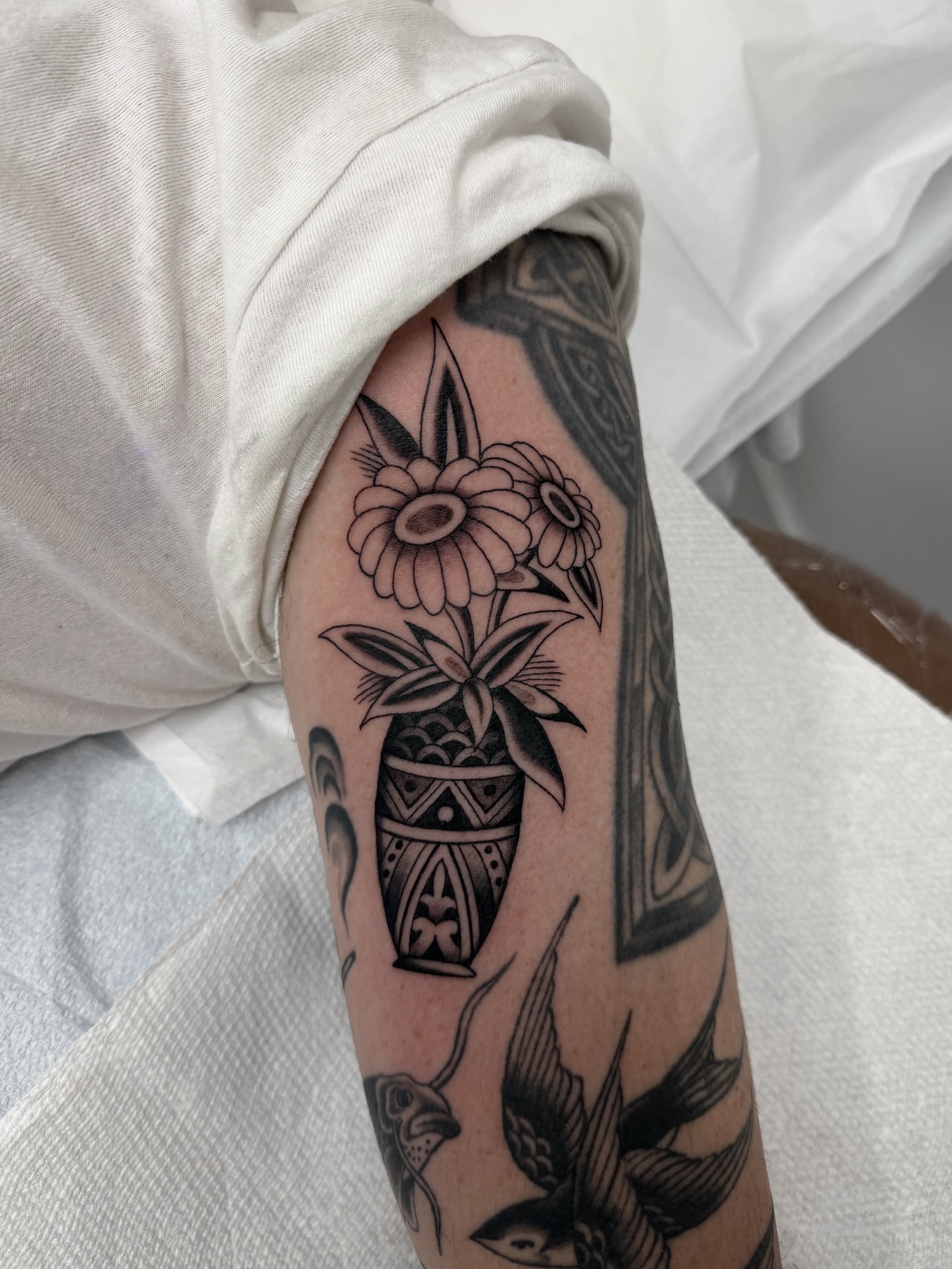 Flower vase black and grey tattoo on the forearm by Nicholas Lee, San Francisco, California