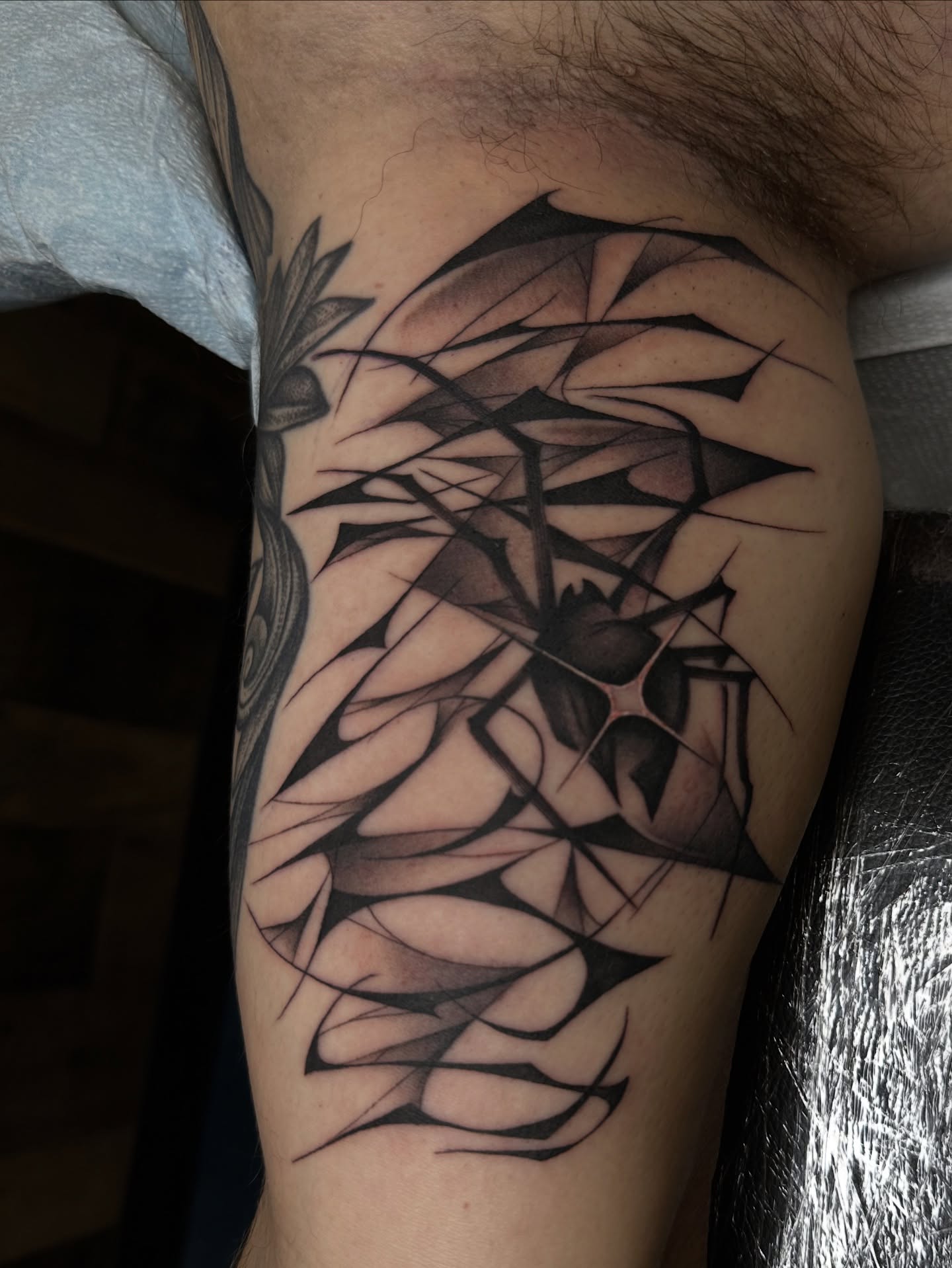 Geometric abstract geometric tattoo on the forearm by Sam Minneci