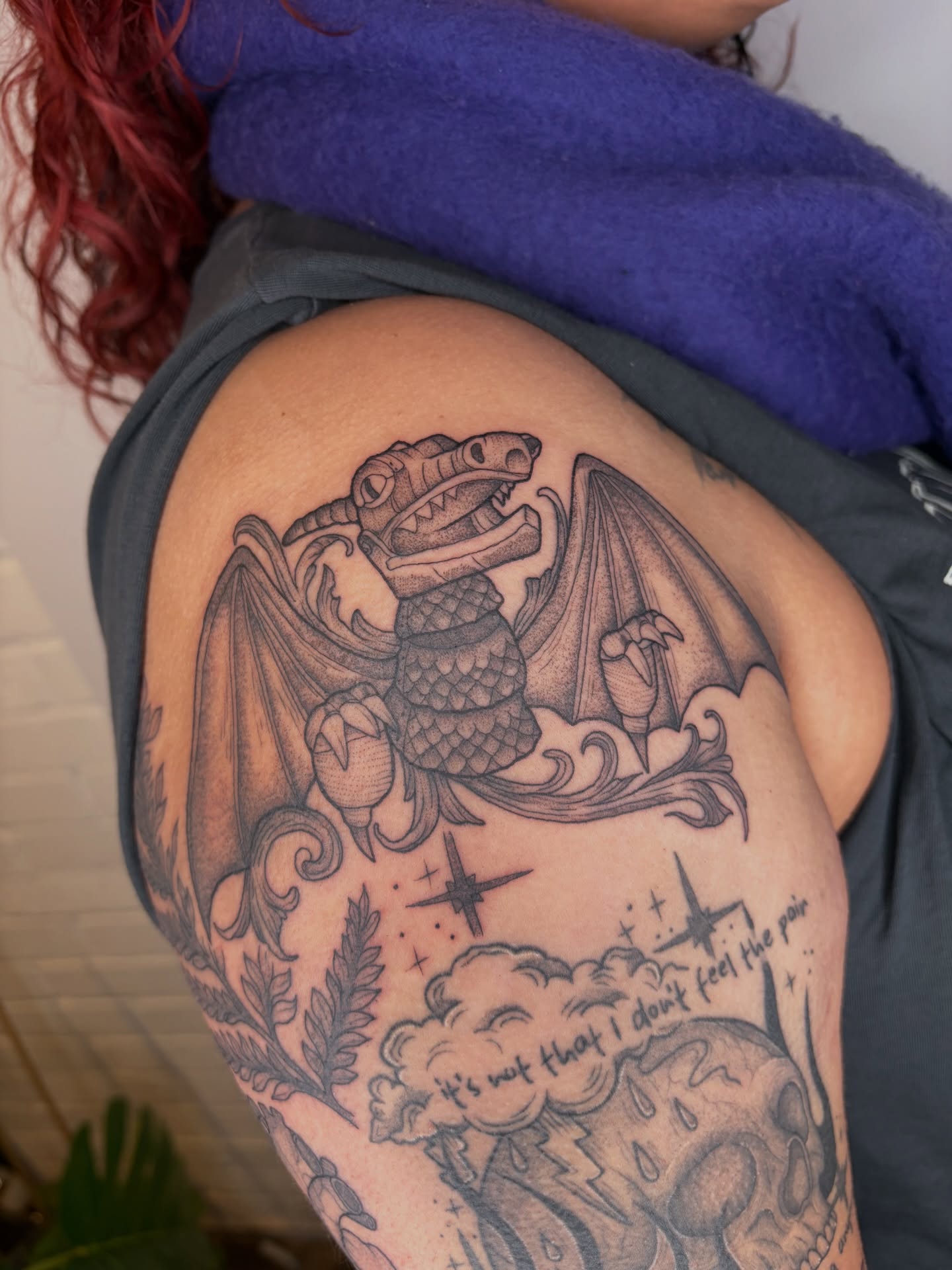 Dragon and skull black and grey tattoo on the shoulder by Poppy Olivia Deards