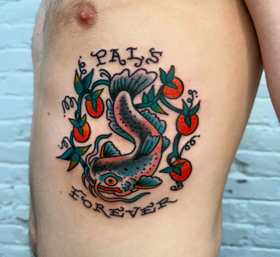 Catfish and tomatoes tattoo on the thigh by Victoria Lagano NYC Traditional Tattoos