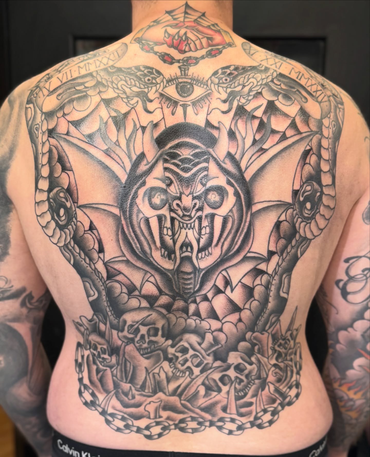 Demon skull dark realism tattoo on the back by Michael Roehrich (MEECH!)