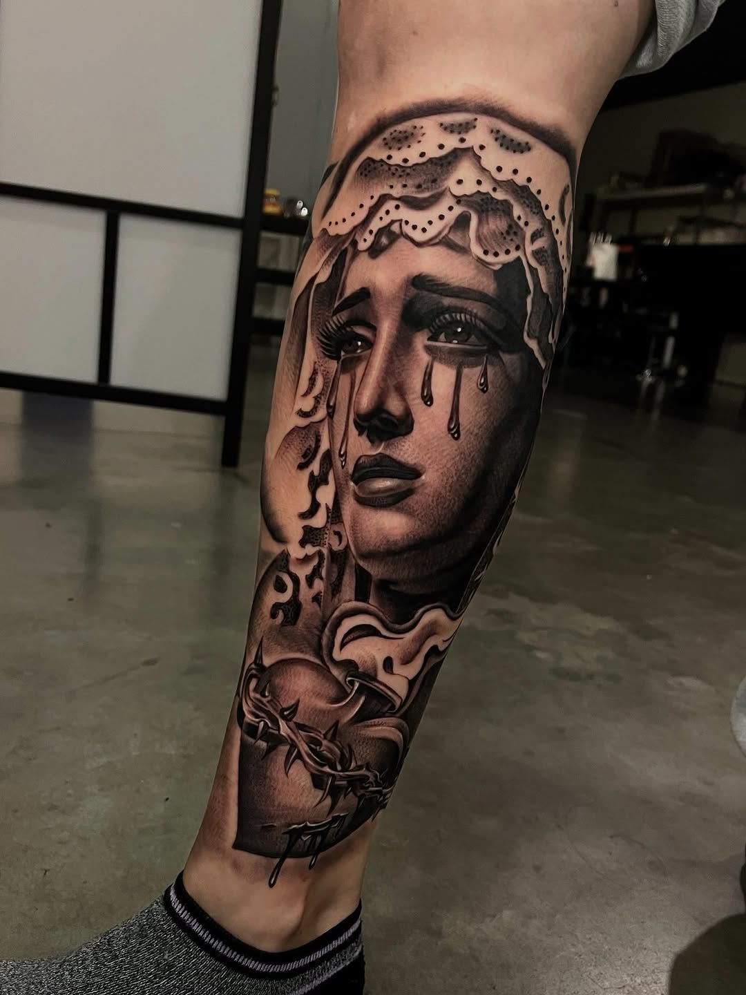 Tattoo by @tattoo_isaac562 — realism, black_and_grey