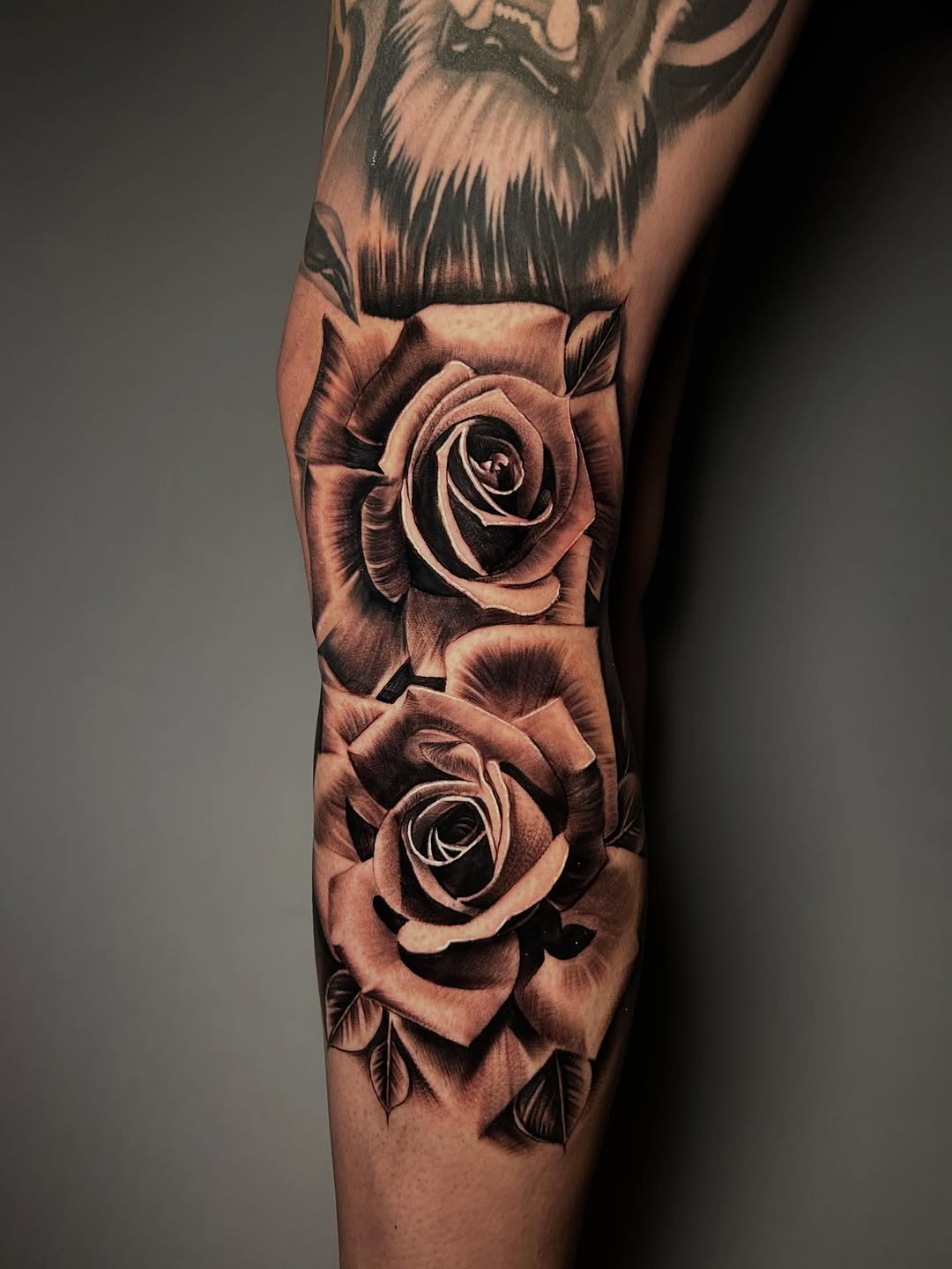 Tattoo by @tattoo_isaac562 — realism, black_and_grey