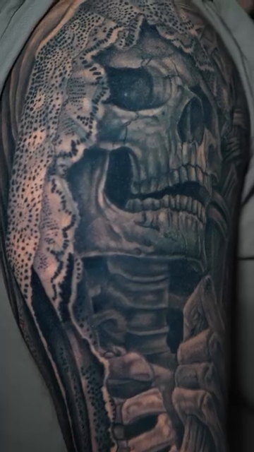 Skull and bones dark realism tattoo by Drex - Dallas Tattoo Artist