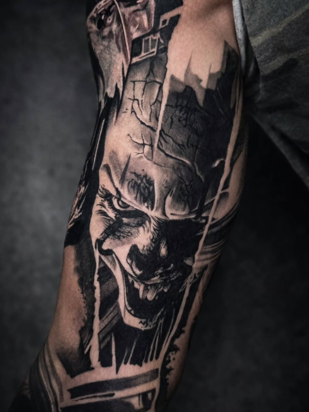 Creepy clown face realism tattoo on the forearm by Lukasz Olszanski