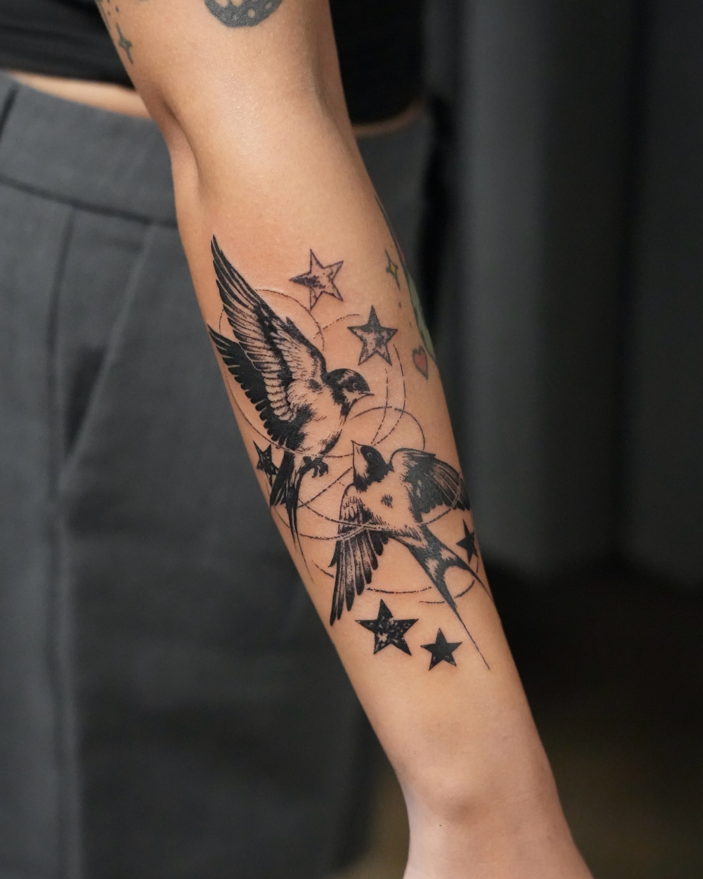 Swallows and stars black and grey tattoo on the forearm by alyssa ⋆₊ ♱